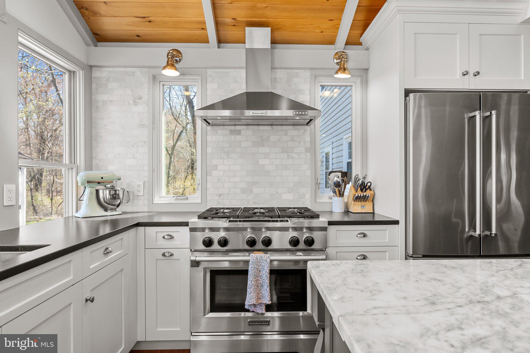85 Brownsburg Road Newtown, PA 18940 - Photo 24 of 66 a kitchen with stainless steel appliances a stove and a refrigerator