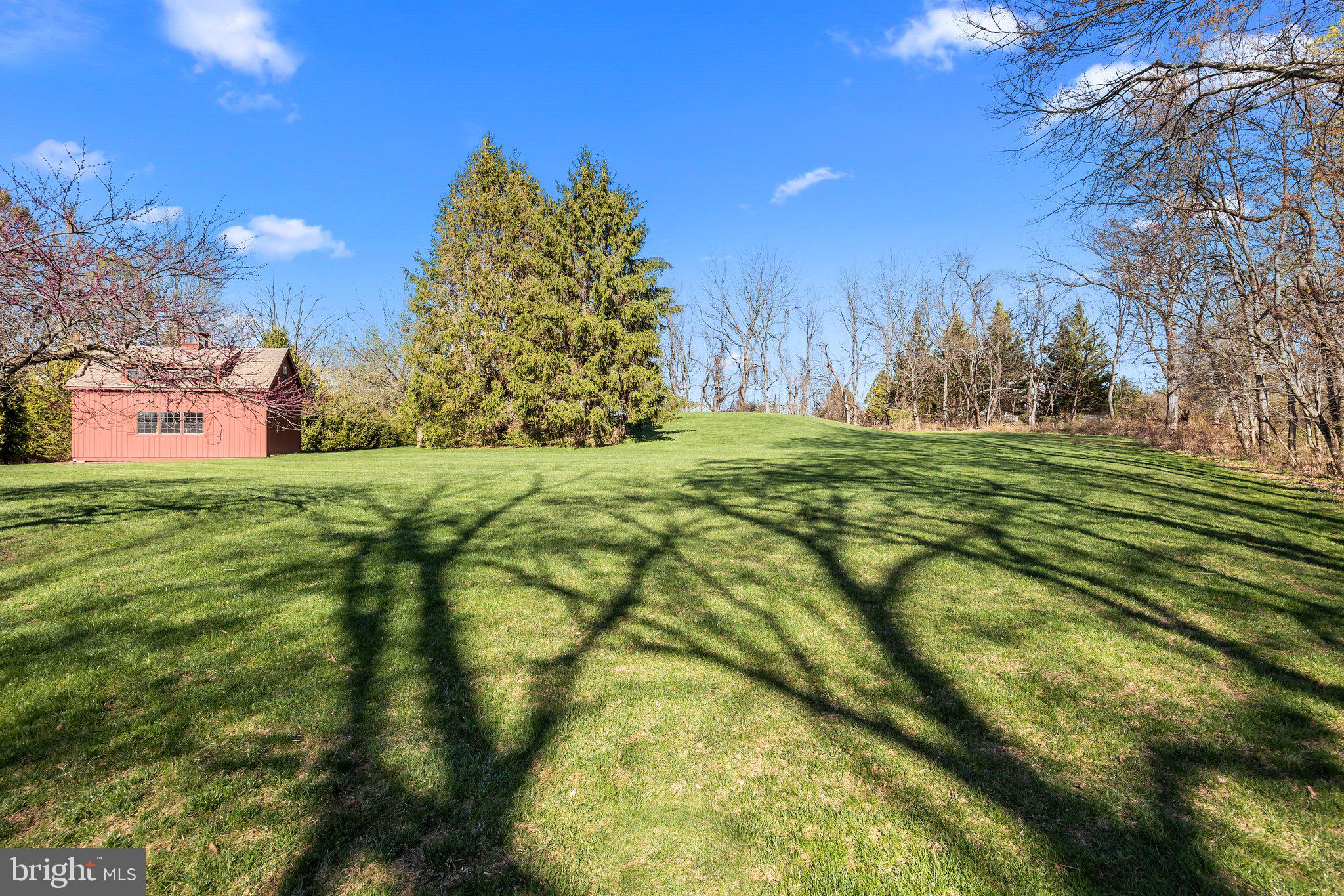 85 Brownsburg Road Newtown, PA 18940 - Photo 52 of 66 a big yard with lots of green space and house in the background