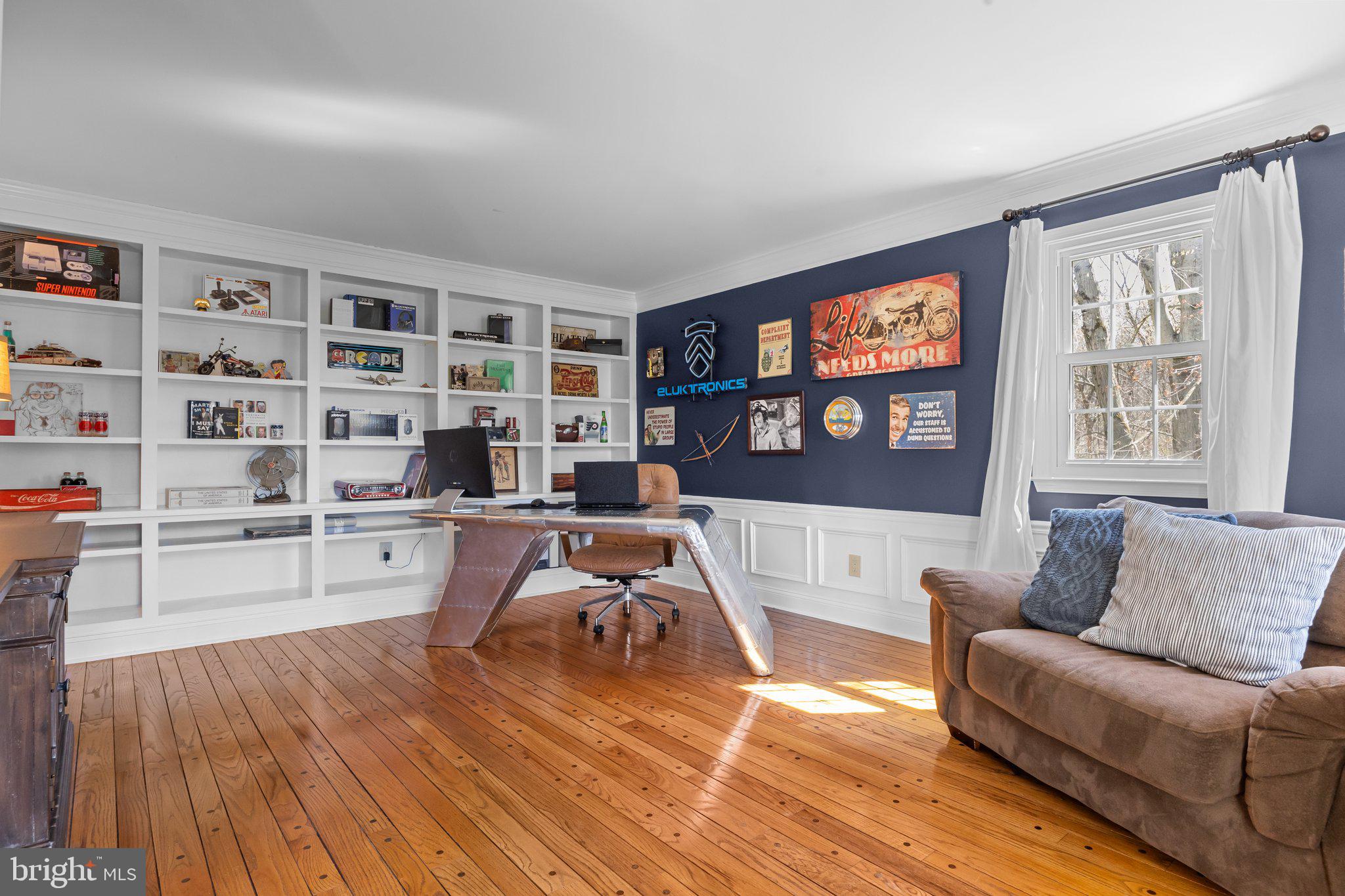 85 Brownsburg Road Newtown, PA 18940 - Photo 8 of 66 a living room with furniture and a wooden floor