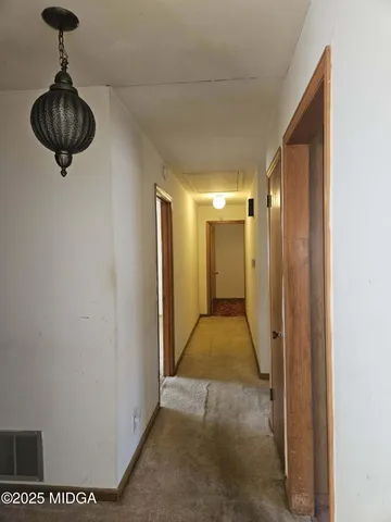 a view of a hallway with a elevator