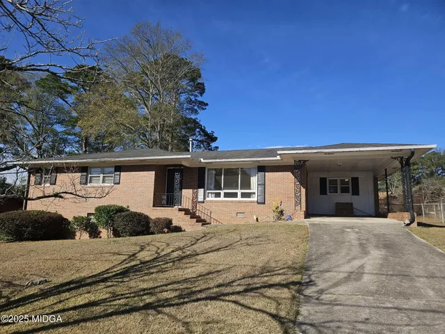 a view of a house with a patio