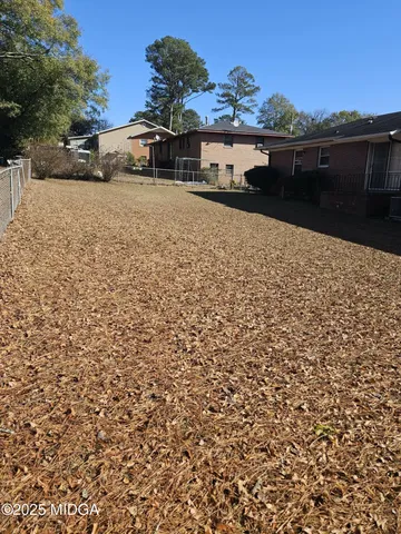 a view of front door of house with stairs