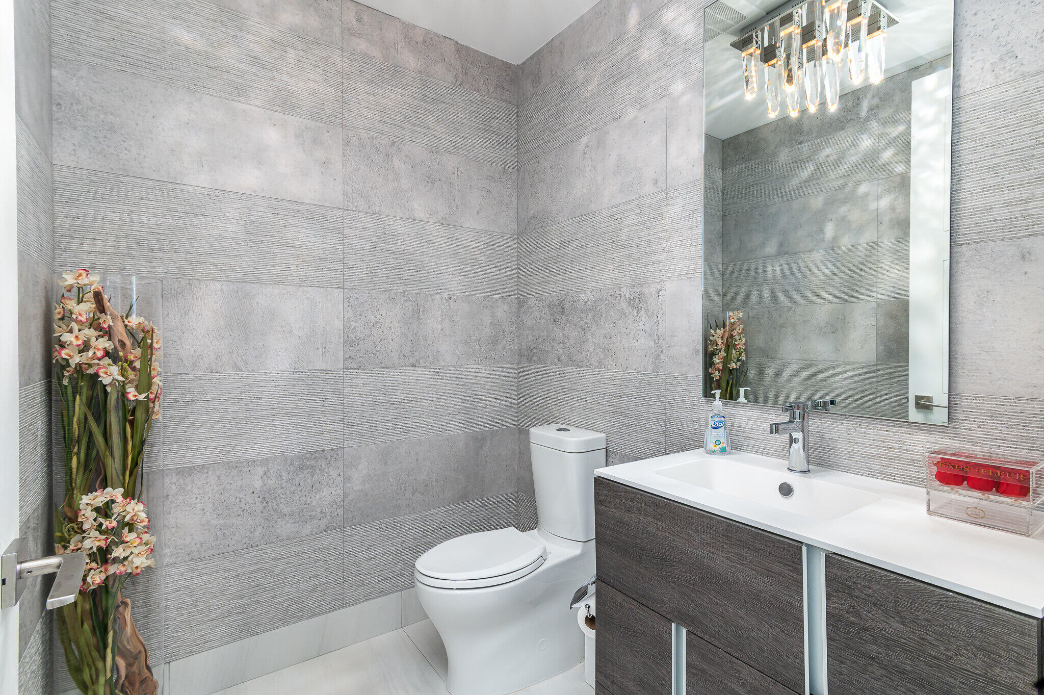 155 East Boca Raton Road, Unit 820 Boca Raton, FL 33432 - Photo 27 of 41 a bathroom with a sink a toilet and shower