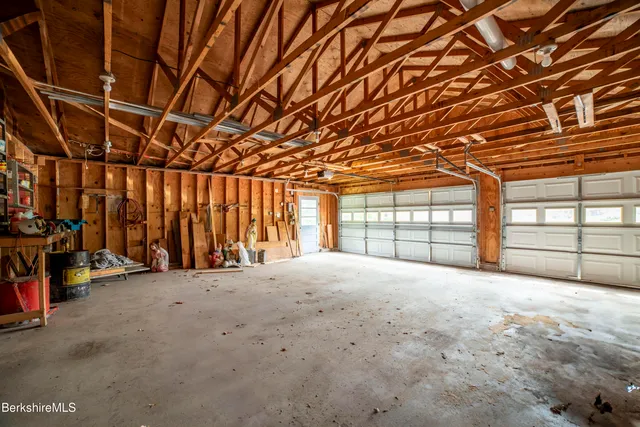 a view of an empty room with windows