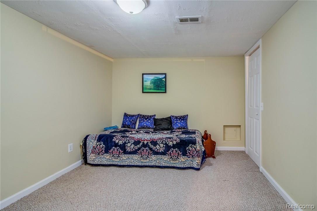 3184 Primrose Drive Rochester, MI 48307 - Photo 41 of 48 Another Extra Lower Level Room - Can you say craft/hobby room?