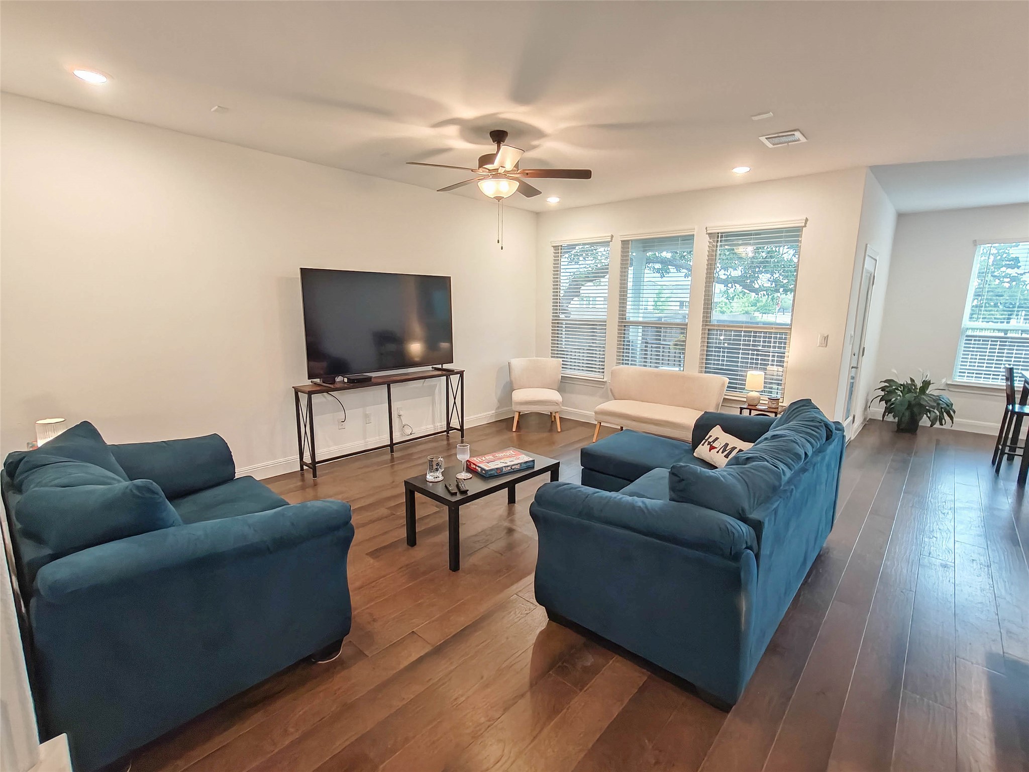 200 Fiddleneck Road Marble Falls, TX 78654 - Photo 4 of 37 a living room with furniture and a flat screen tv