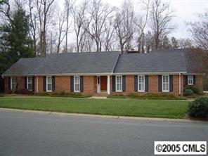 3031 Wickersham Road Charlotte, NC 28211 - Photo 1 of 8 a front view of a house with a garden