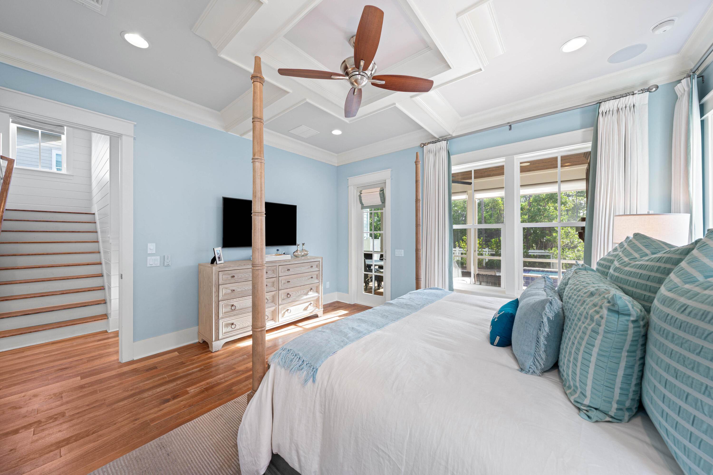 655 East Royal Fern Way Santa Rosa Beach, FL 32459 - Photo 19 of 75 a spacious bedroom with a bed a flat screen tv and a large window