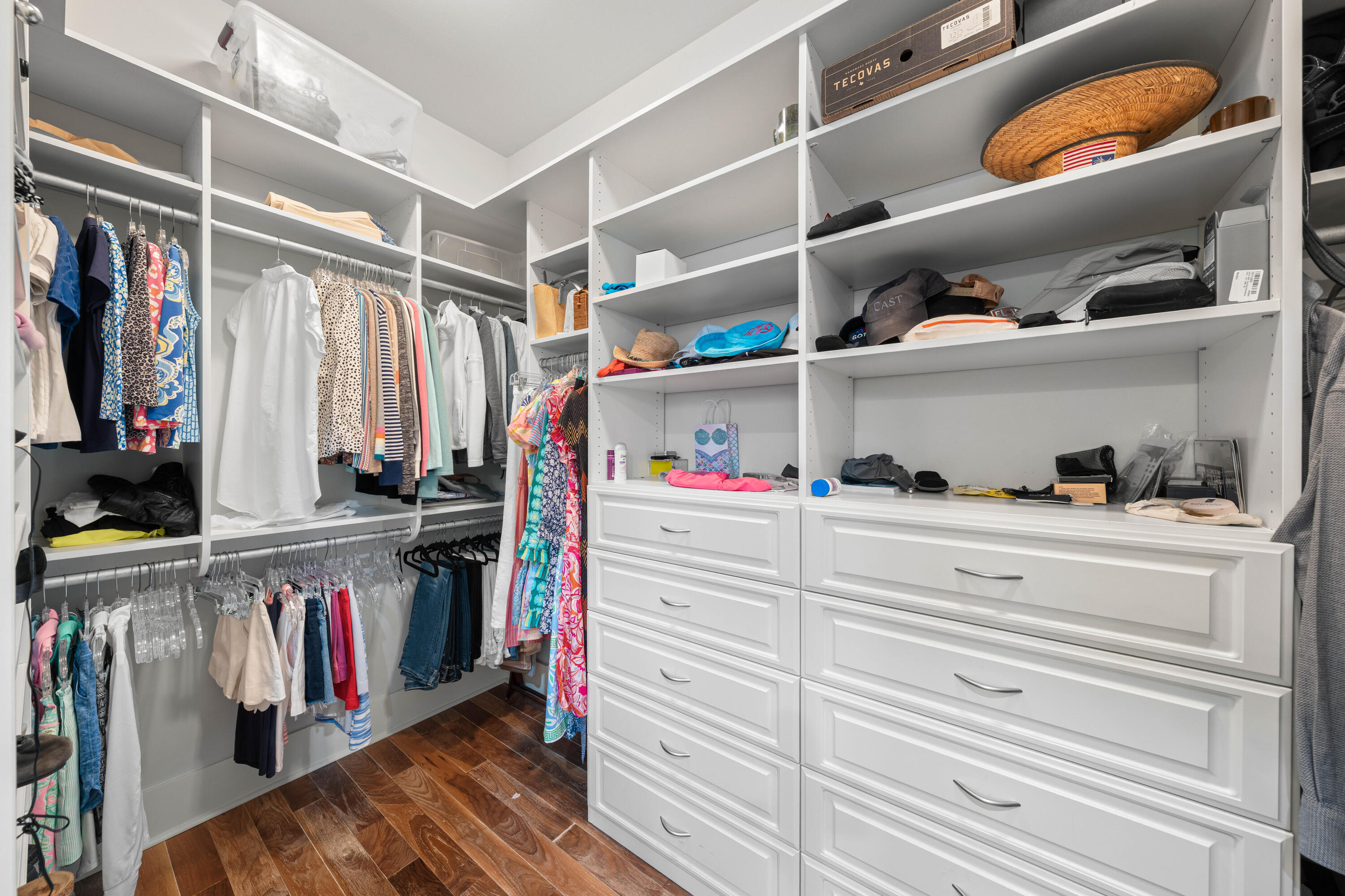 655 East Royal Fern Way Santa Rosa Beach, FL 32459 - Photo 21 of 75 a view of walk in closet with clothes and shoes