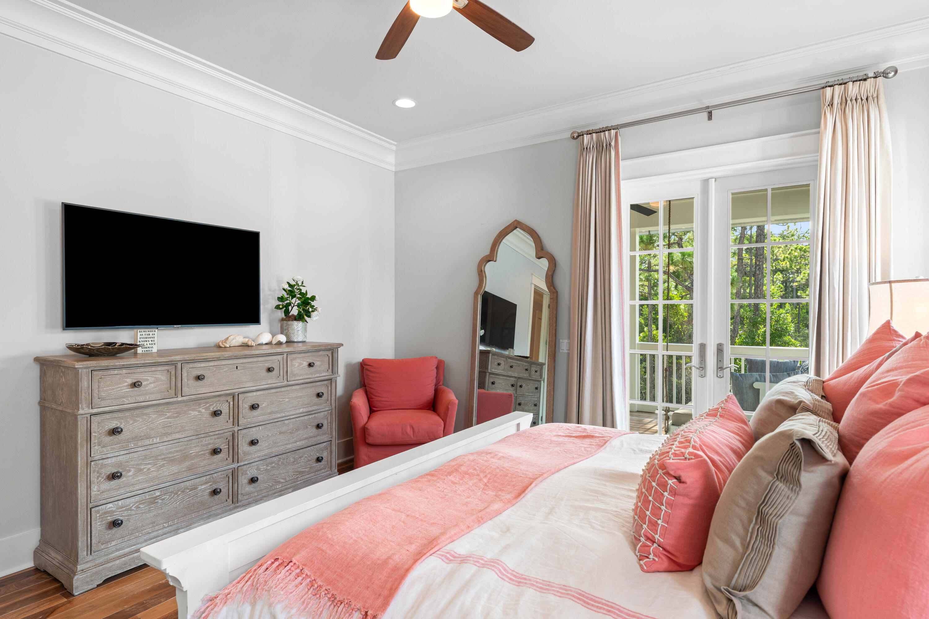 655 East Royal Fern Way Santa Rosa Beach, FL 32459 - Photo 35 of 75 a bedroom with a bed and a flat screen tv