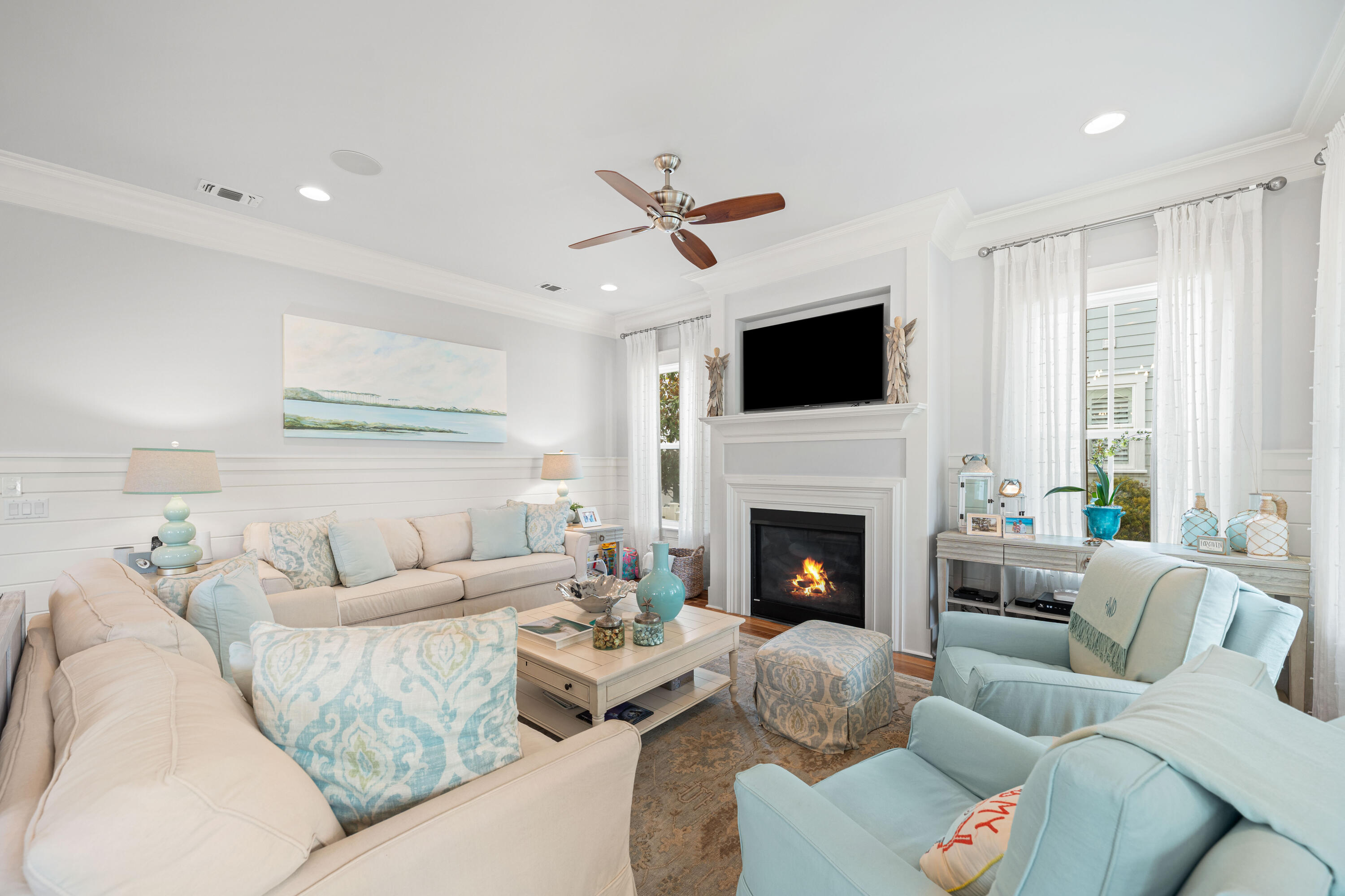 655 East Royal Fern Way Santa Rosa Beach, FL 32459 - Photo 4 of 75 a living room with furniture fireplace and flat screen tv
