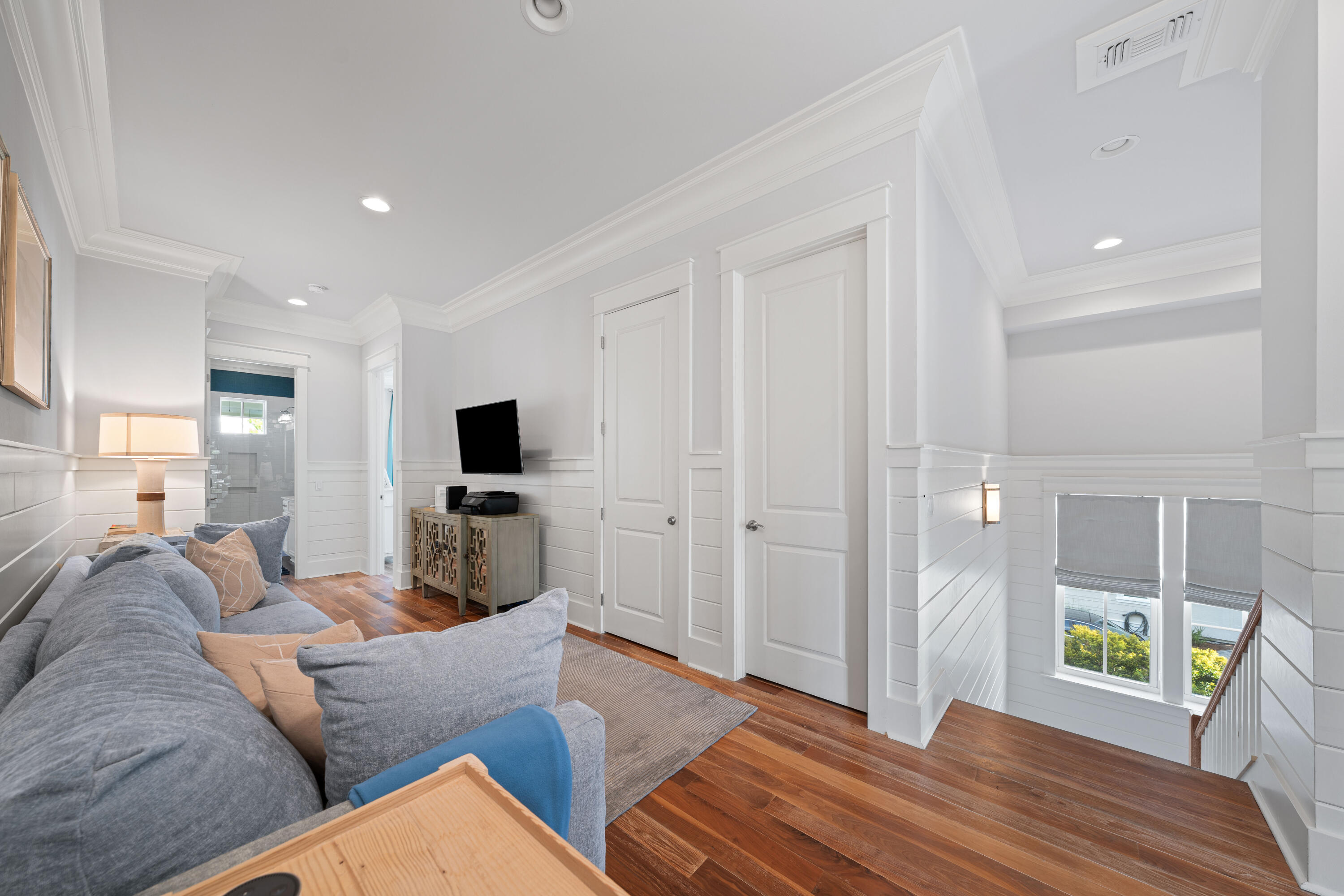 655 East Royal Fern Way Santa Rosa Beach, FL 32459 - Photo 42 of 75 a living room with furniture and a flat screen tv