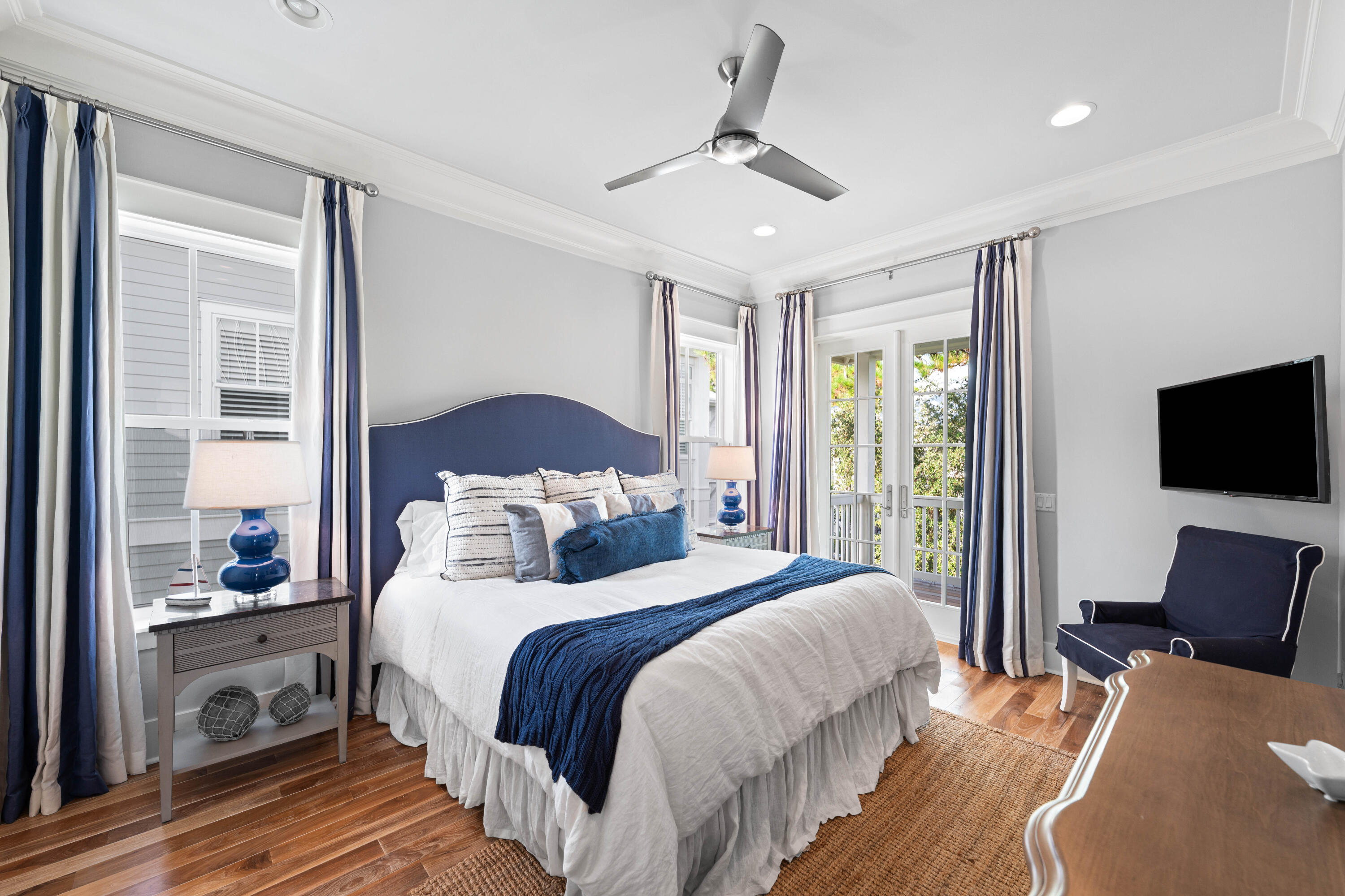 655 East Royal Fern Way Santa Rosa Beach, FL 32459 - Photo 47 of 75 a bedroom with a bed and a flat screen tv