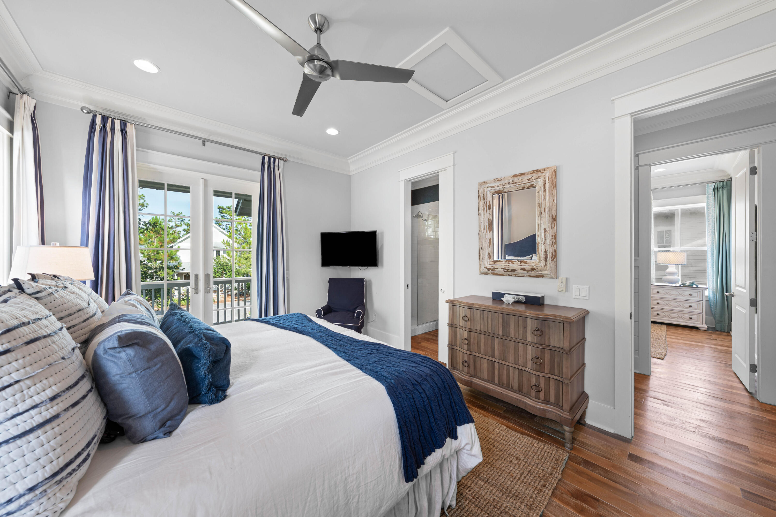 655 East Royal Fern Way Santa Rosa Beach, FL 32459 - Photo 48 of 75 a large bedroom with a bed and a flat screen tv