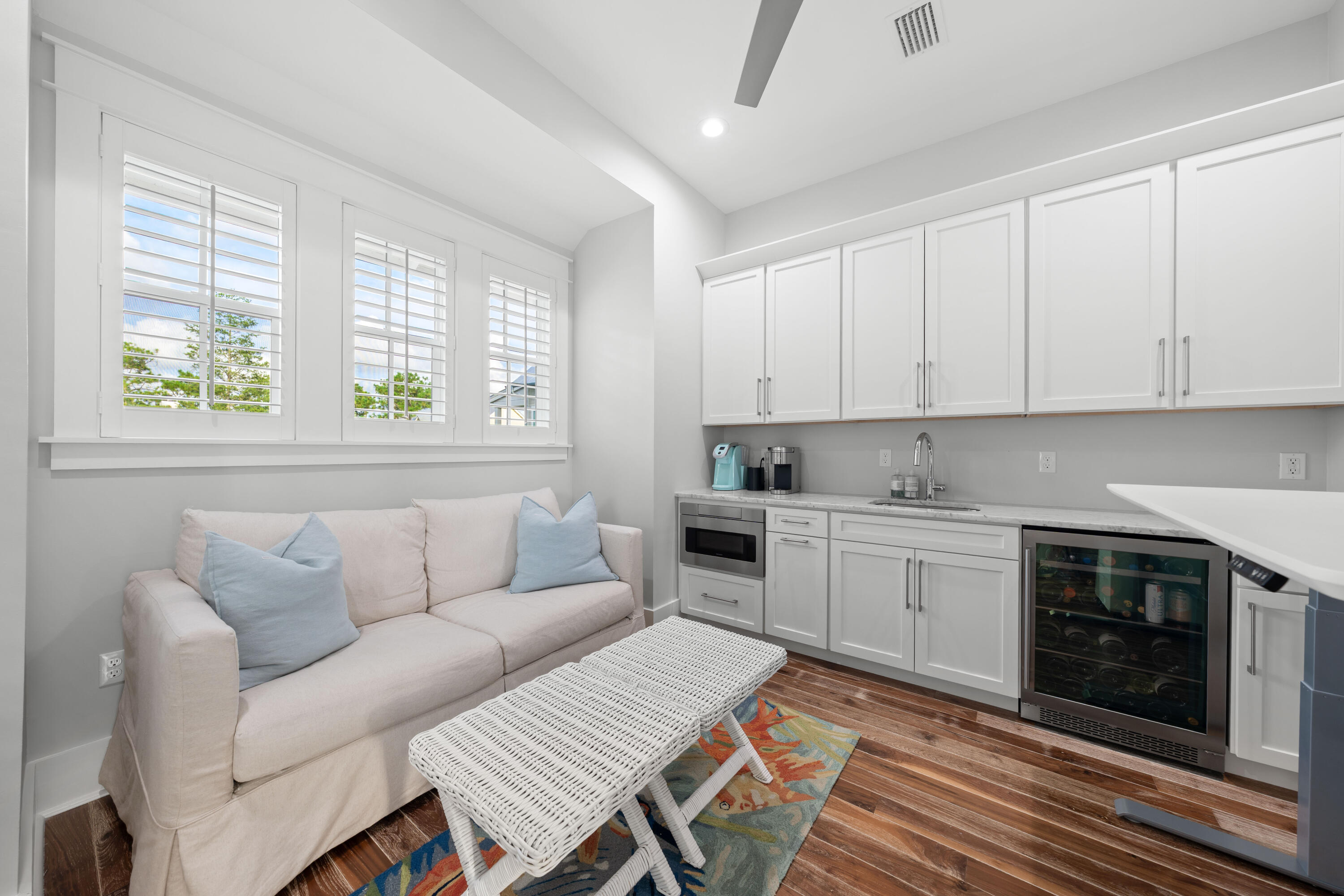 655 East Royal Fern Way Santa Rosa Beach, FL 32459 - Photo 58 of 75 a living room with furniture and a stove top oven