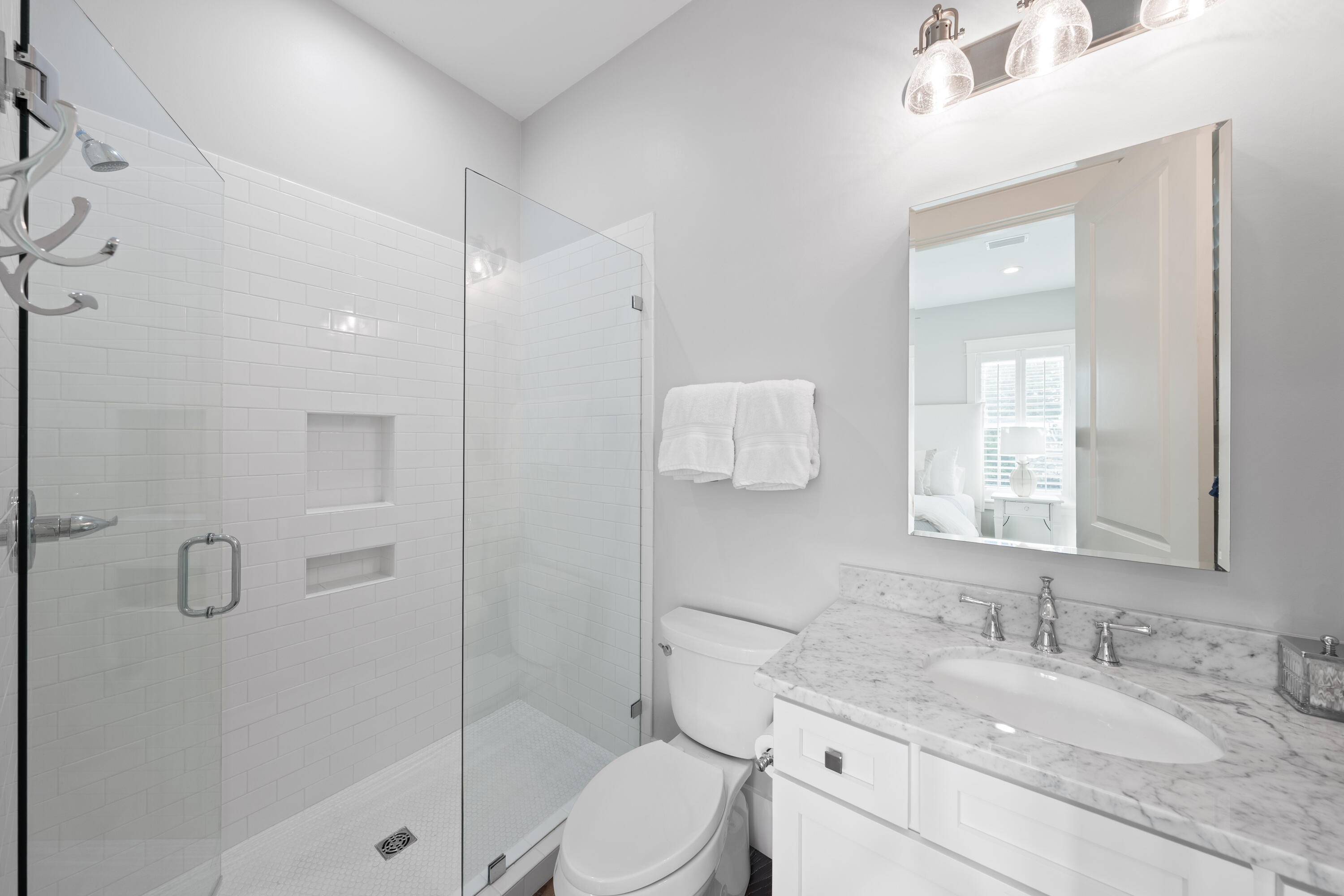 655 East Royal Fern Way Santa Rosa Beach, FL 32459 - Photo 61 of 75 a bathroom with a granite countertop sink a toilet and shower