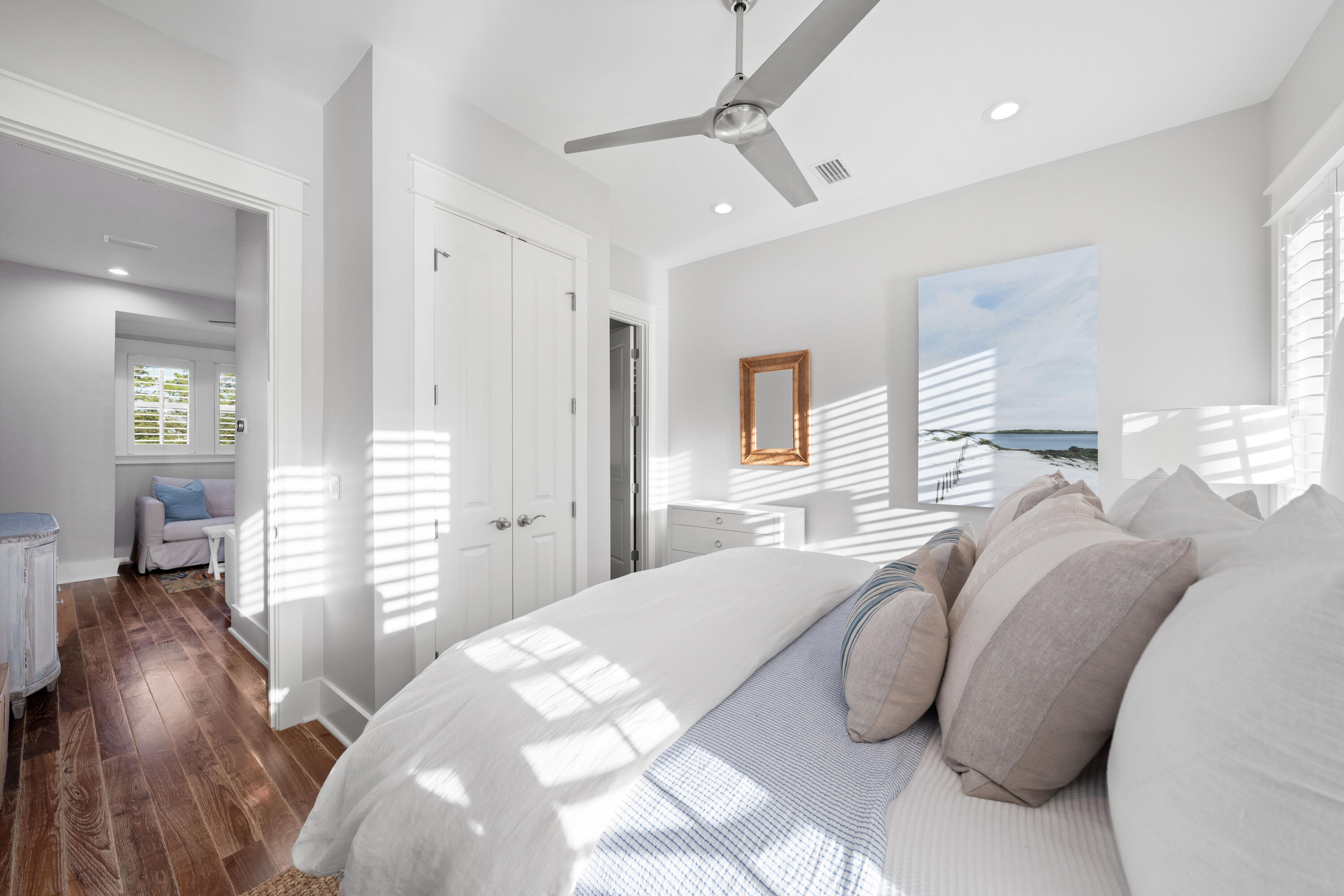 655 East Royal Fern Way Santa Rosa Beach, FL 32459 - Photo 62 of 75 a bedroom with a bed and a large mirror