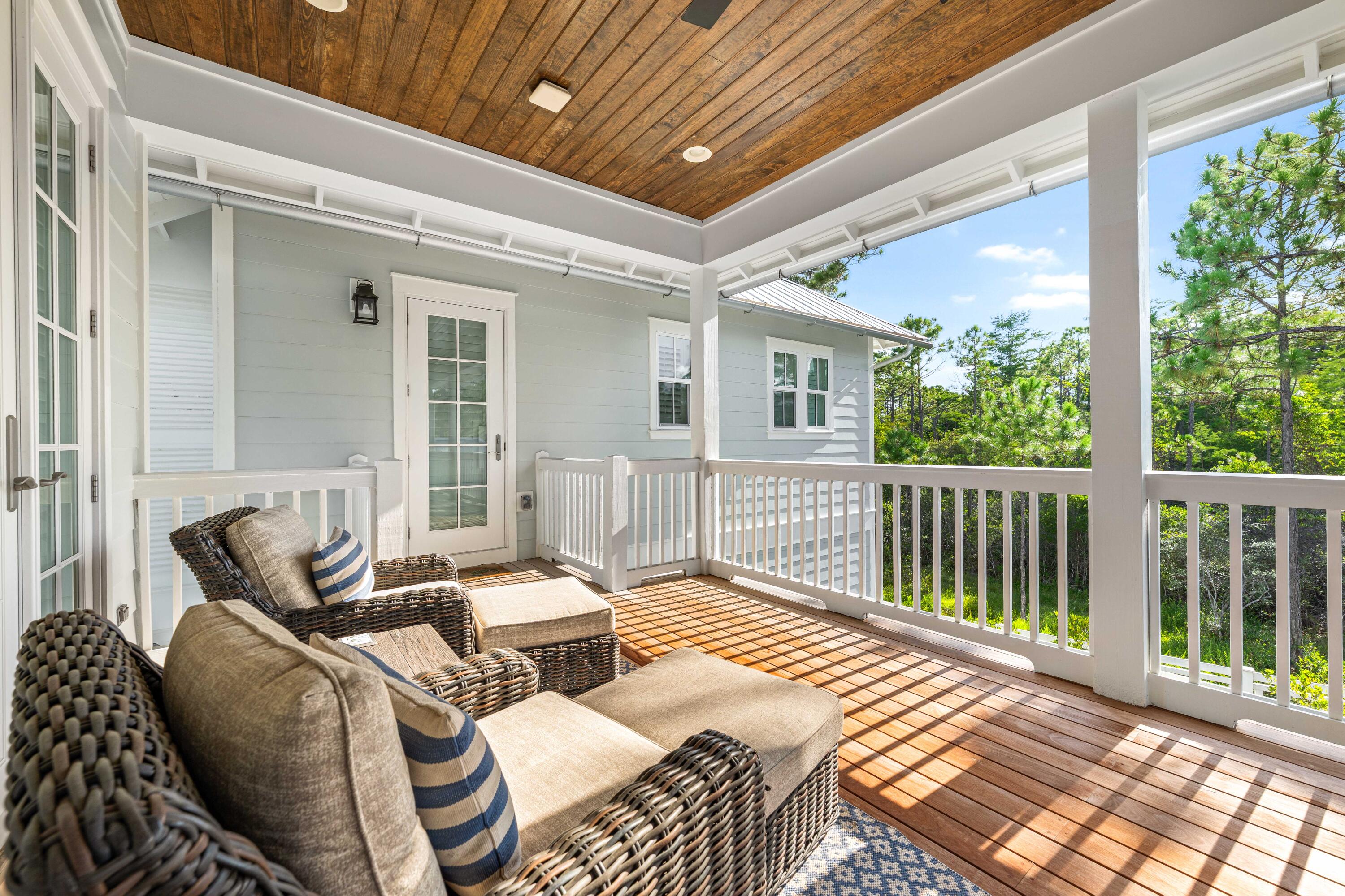 655 East Royal Fern Way Santa Rosa Beach, FL 32459 - Photo 75 of 75 a view of a patio with wooden floor