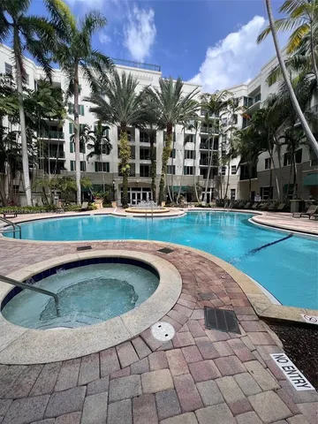 a row of car parked on the side of street