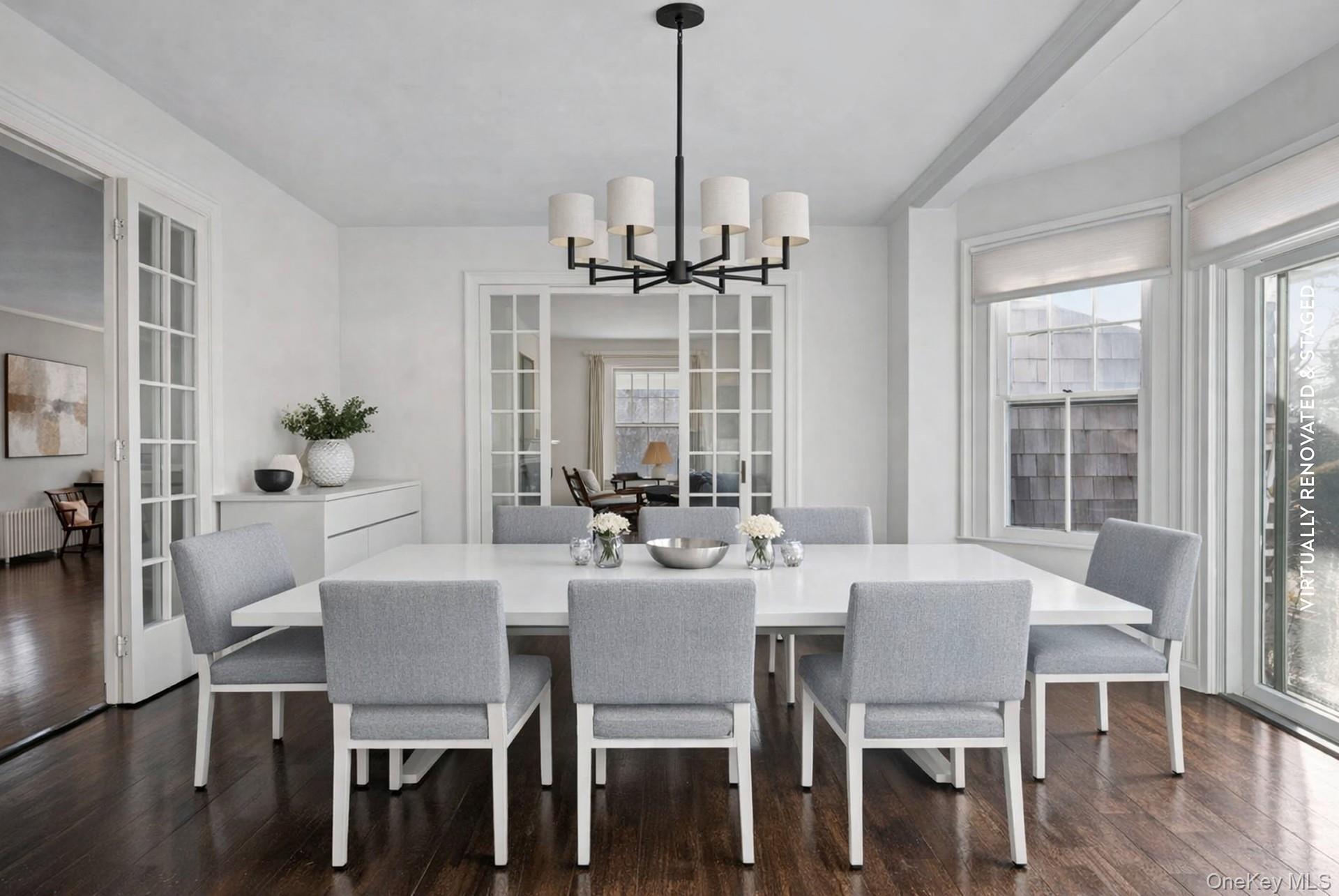 11 Shinnecock Road Quogue, NY 11959 - Photo 13 of 50 a view of a dining room with furniture window and wooden floor