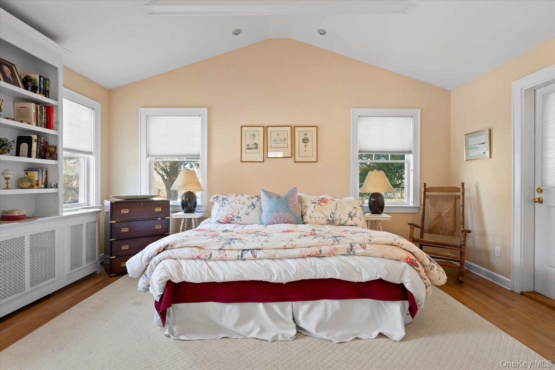 11 Shinnecock Road Quogue, NY 11959 - Photo 25 of 50 a bedroom with a bed and a cabinets