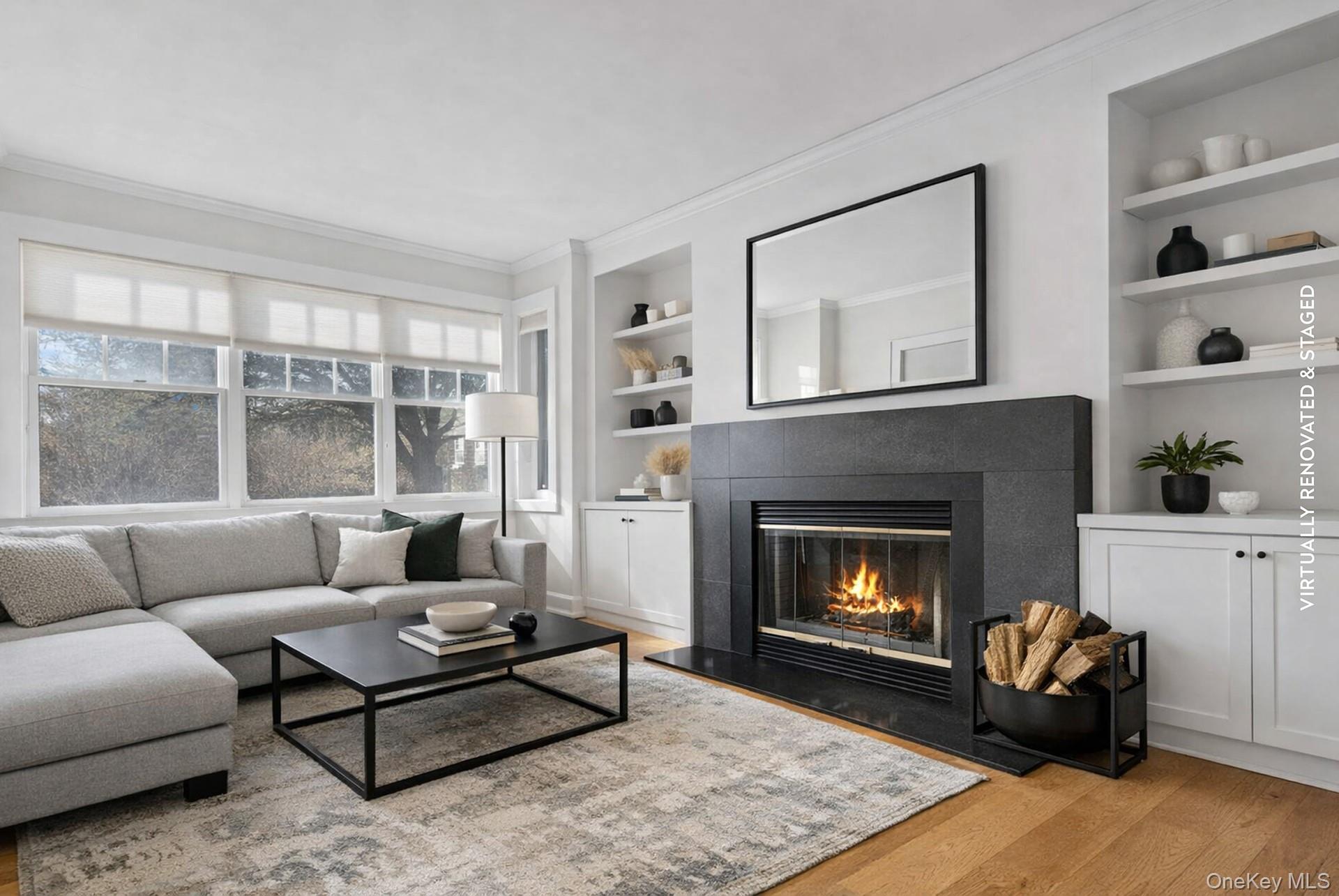 11 Shinnecock Road Quogue, NY 11959 - Photo 27 of 50 a living room with furniture and a fireplace