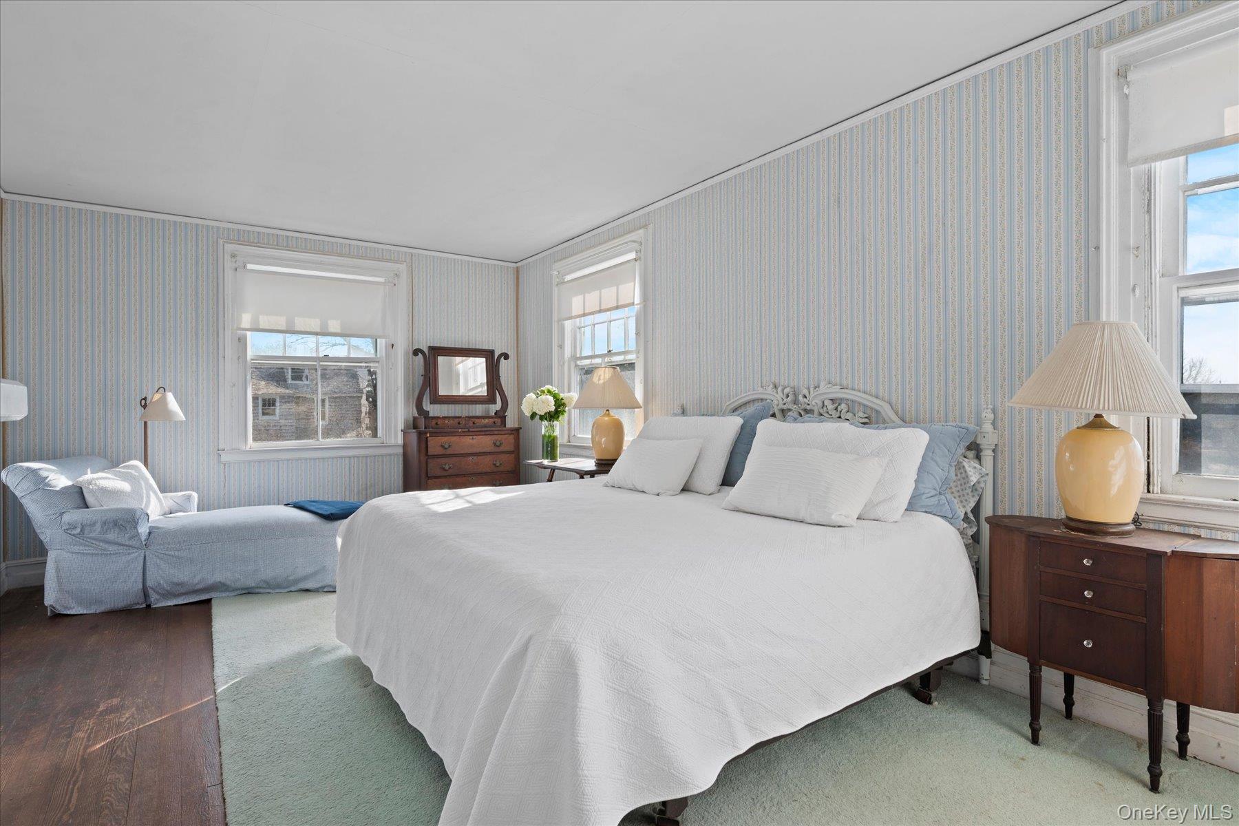 11 Shinnecock Road Quogue, NY 11959 - Photo 33 of 50 a bedroom with a bed and window