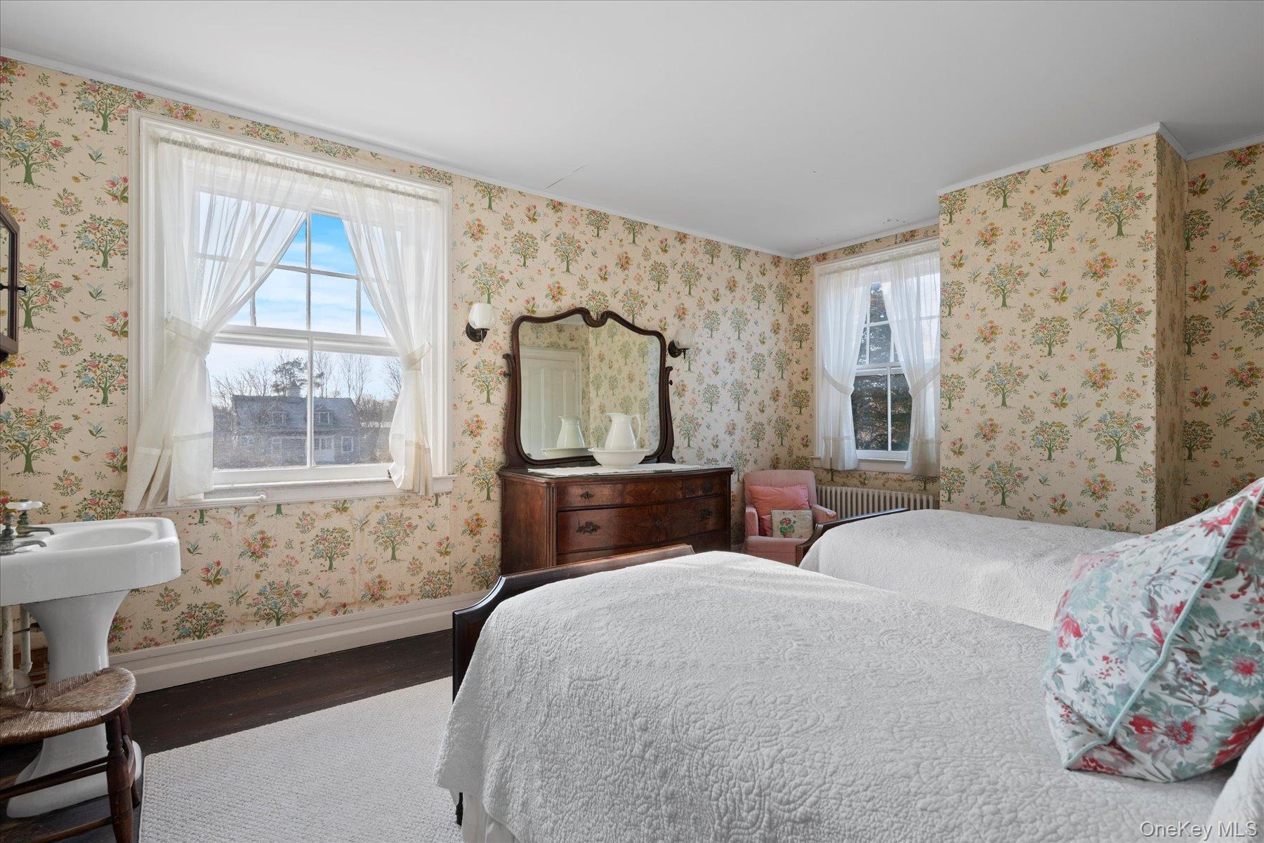 11 Shinnecock Road Quogue, NY 11959 - Photo 40 of 50 a bedroom with a bed and a window