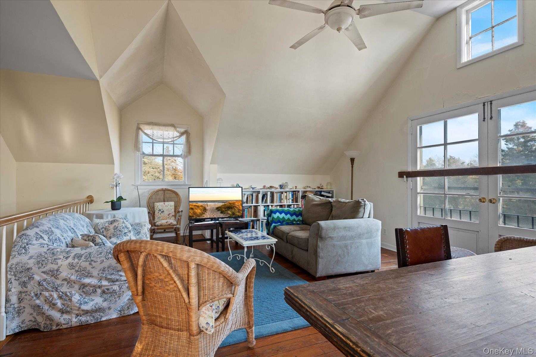11 Shinnecock Road Quogue, NY 11959 - Photo 46 of 50 a living room with furniture and a fireplace