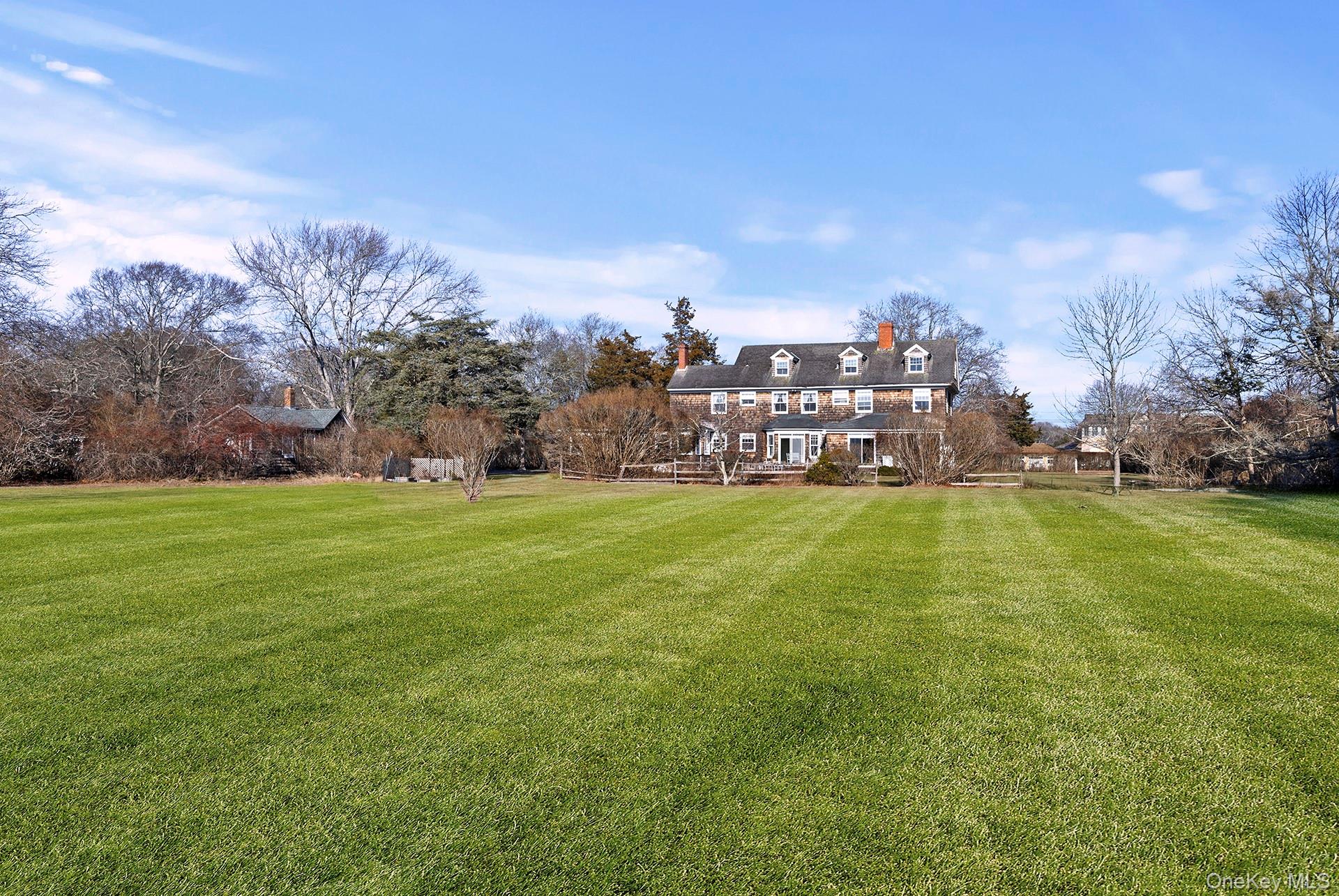 11 Shinnecock Road Quogue, NY 11959 - Photo 7 of 50 a view of a town with big trees