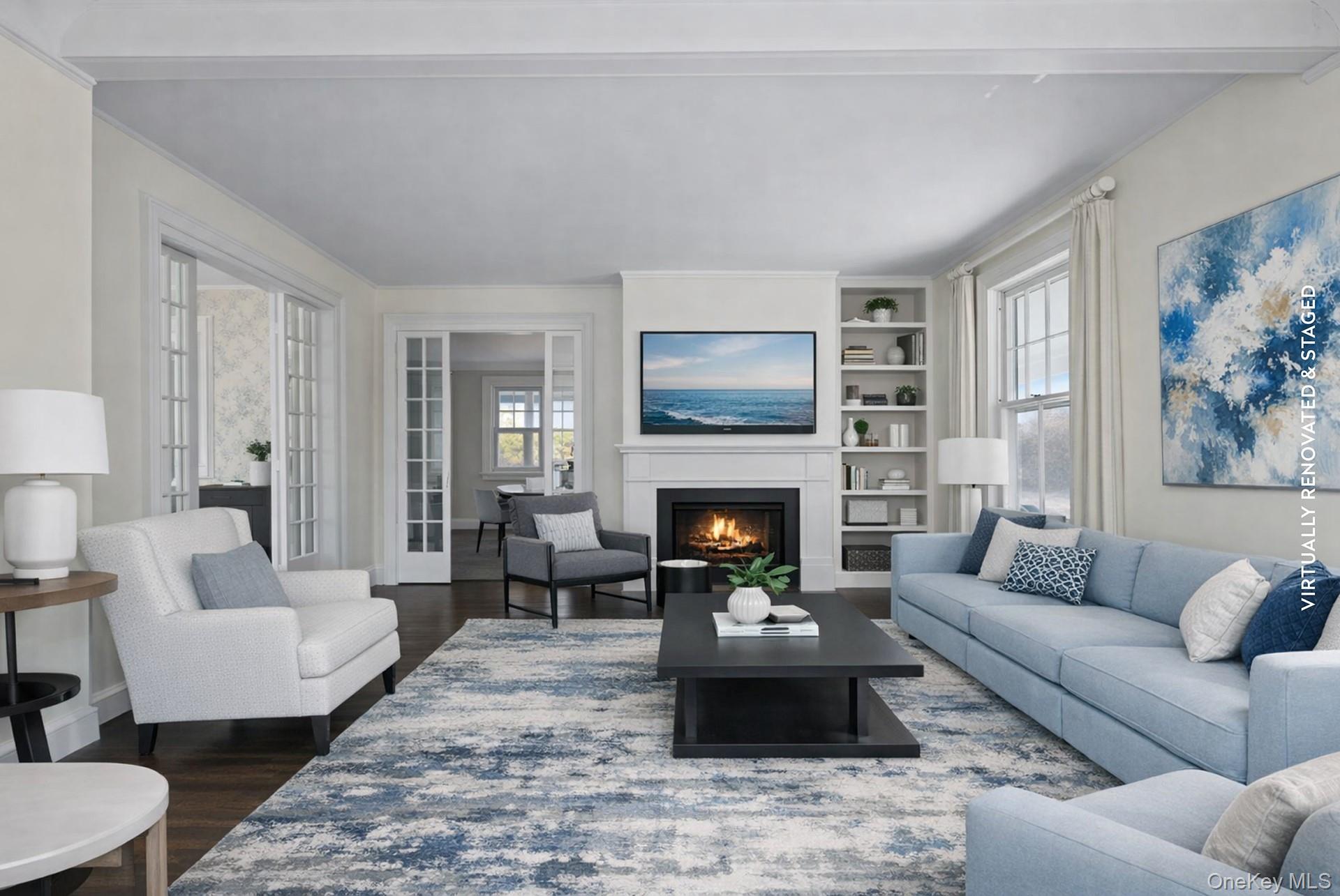 11 Shinnecock Road Quogue, NY 11959 - Photo 10 of 50 a living room with furniture and a fireplace