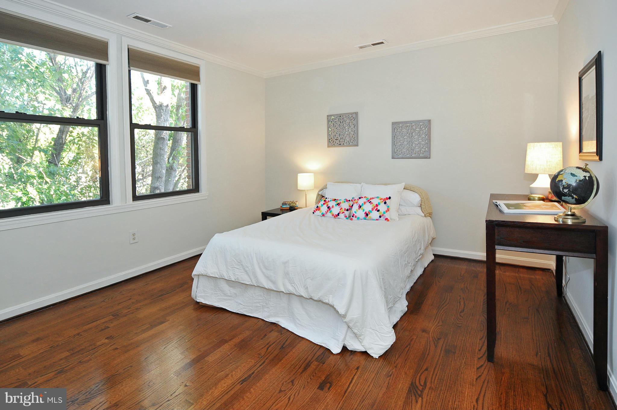 1661 Park Road Northwest, Unit 304 Washington, DC 20010 - Photo 12 of 15 Large bedroom with wood floors