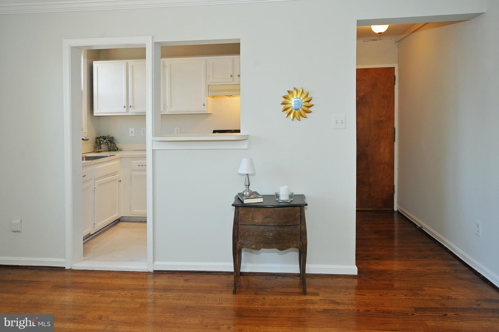 1661 Park Road Northwest, Unit 304 Washington, DC 20010 - Photo 6 of 15 Kitchen and Foyer entry