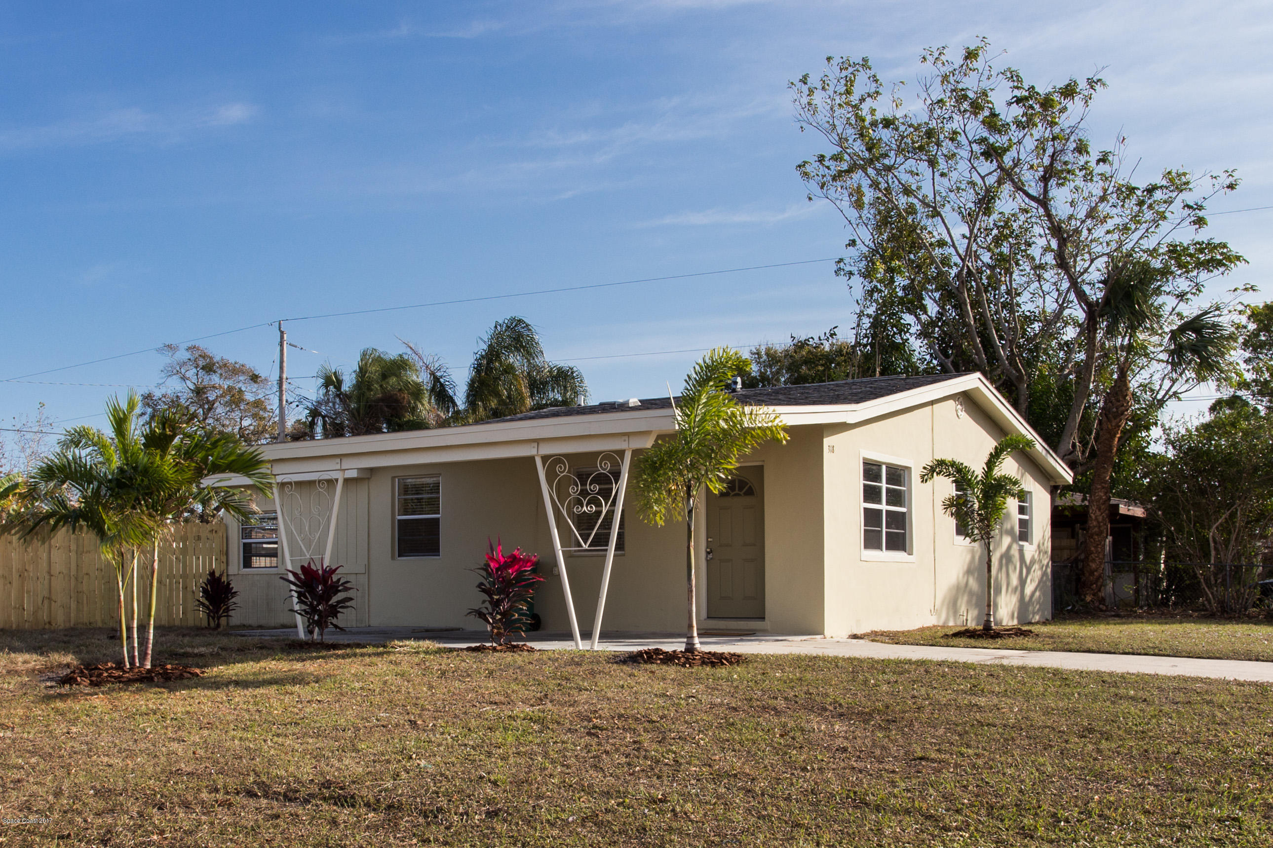 318 West Rutgers Street Melbourne, FL 32901 - Photo 1 of 14 a view of a house with a patio