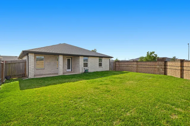 a view of a backyard with a garden