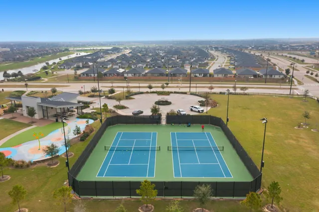 a view of a swimming pool with an ocean view