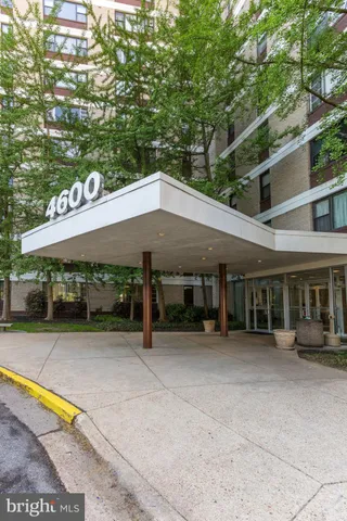 a house with trees in front of it
