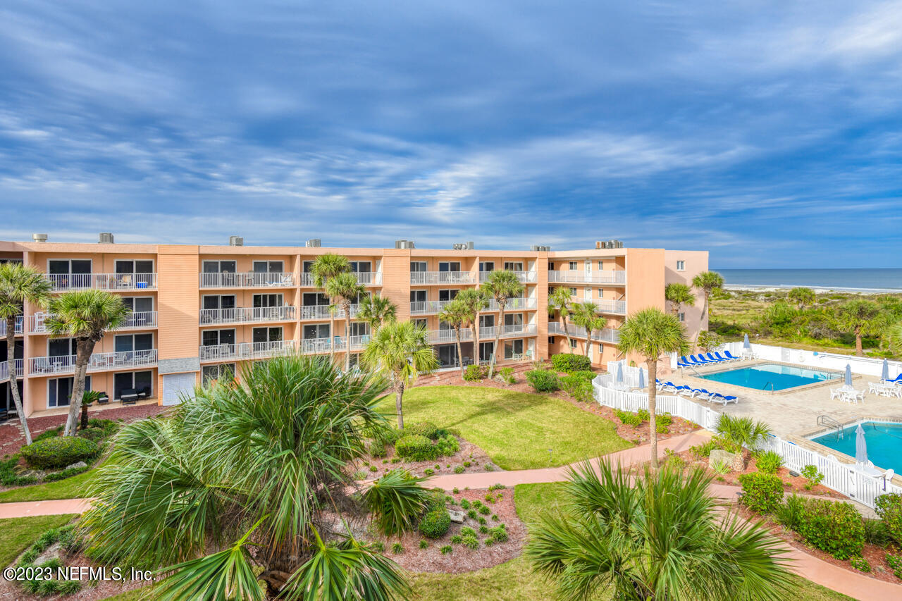 4 Ocean Trace Road, Unit 405 St. Augustine, FL 32080 - Photo 18 of 27 a view of building with outdoor space
