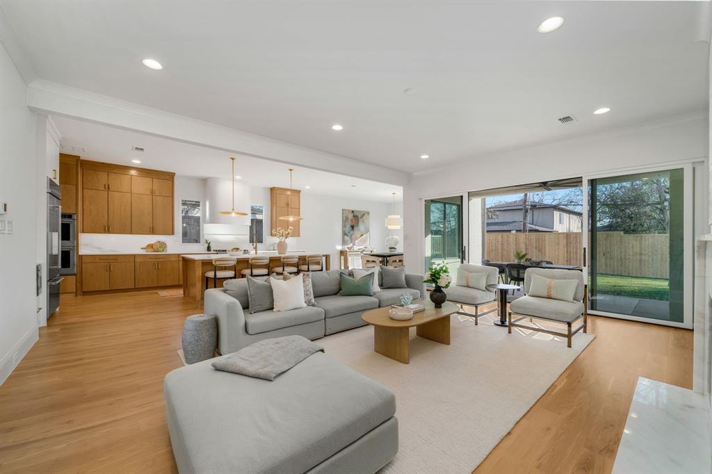 3884 Durango Drive Dallas, TX 75220 - Photo 2 of 16 a living room with furniture and a large window