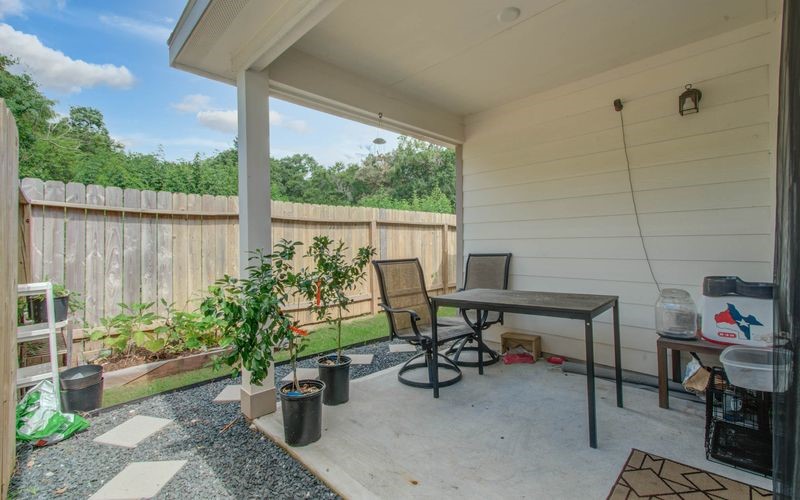 25416 Grotto Falls Lane Porter, TX 77365 - Photo 15 of 15 a view of a tables and chairs in patio