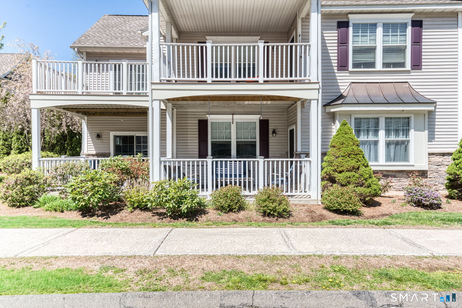 95 South Ridge Lane, Unit E102 Berlin, CT 06037 - Photo 28 of 37 Enjoy access to the porch from both the living room and the primary suite