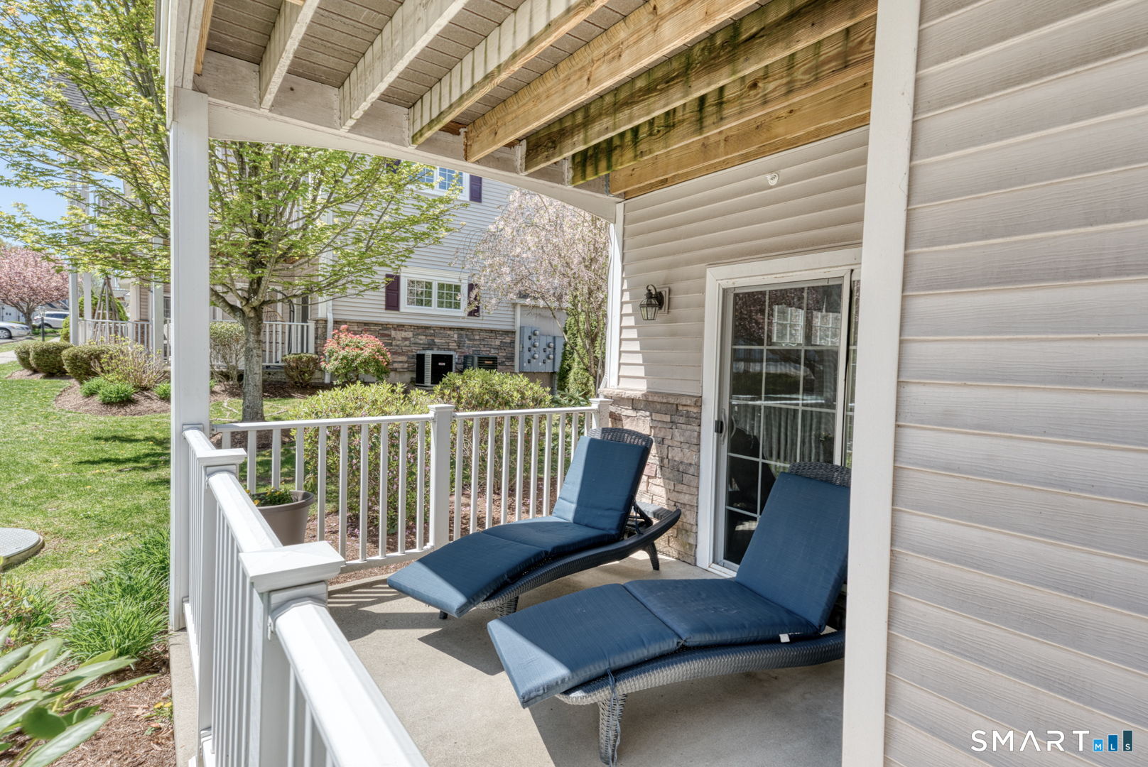 95 South Ridge Lane, Unit E102 Berlin, CT 06037 - Photo 31 of 37 Convenient access to porch from the primary suite ideal for morning coffee with sunrise