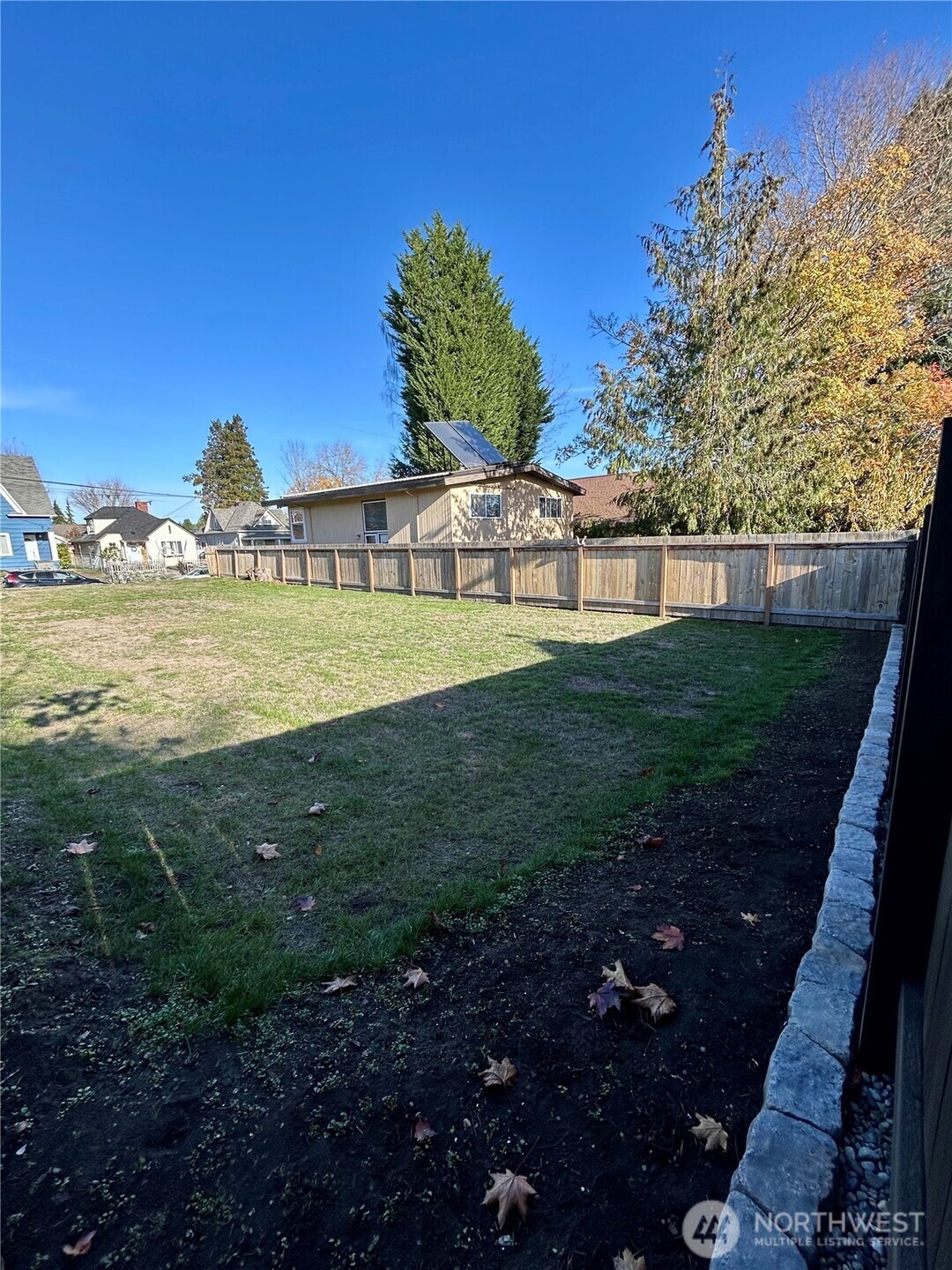 1241 8th Street Bremerton, WA 98337 - Photo 12 of 15 a view of a big yard with an ocean view