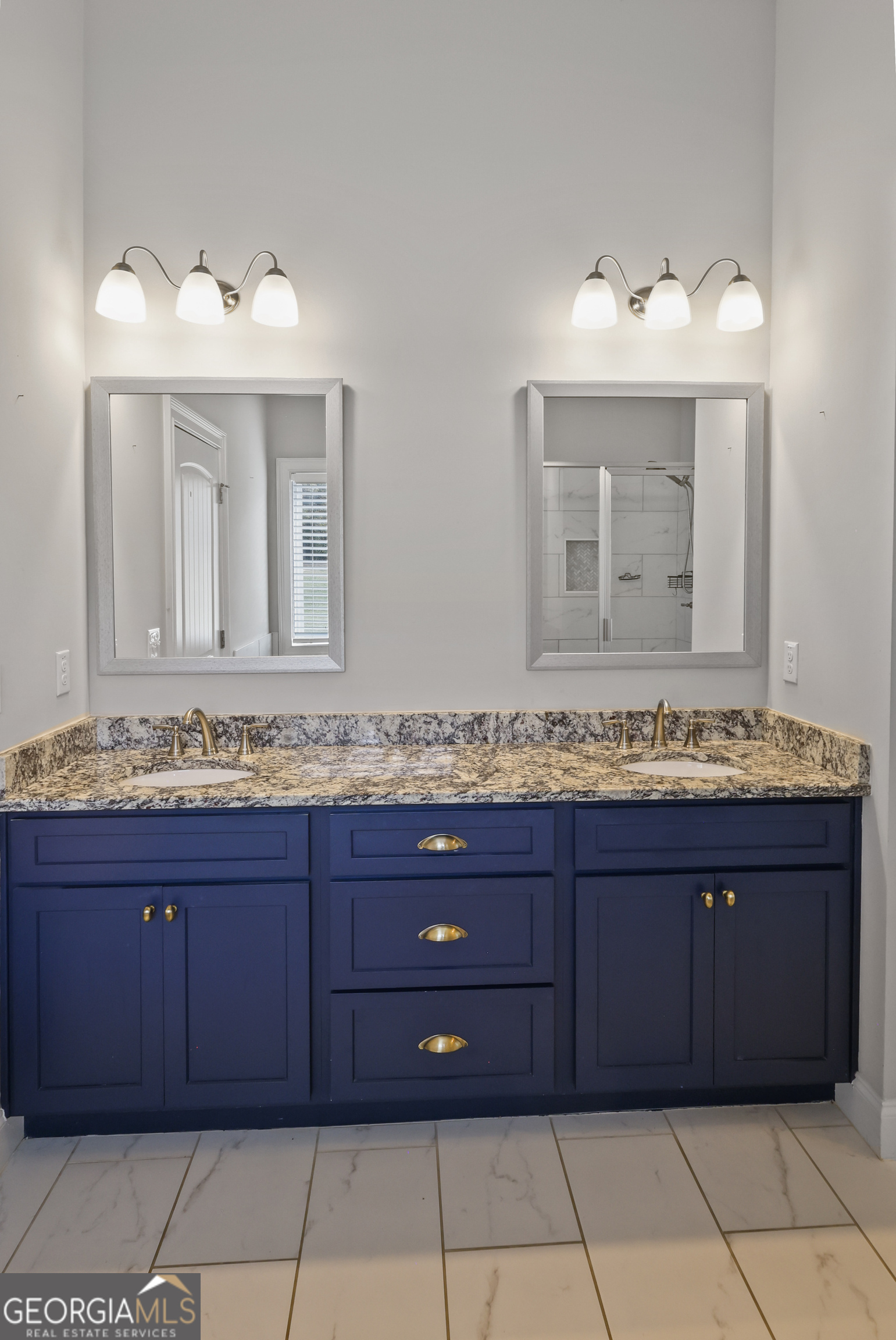 563 Wynn Road McDonough, GA 30252 - Photo 22 of 47 a bathroom with a sink and a mirror