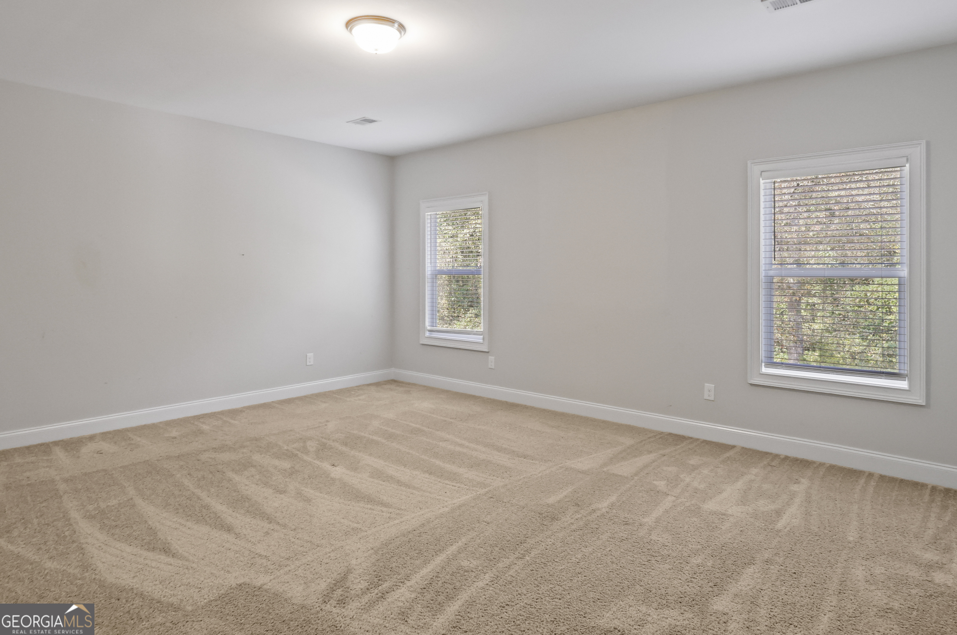 563 Wynn Road McDonough, GA 30252 - Photo 26 of 47 a view of an empty room with a window