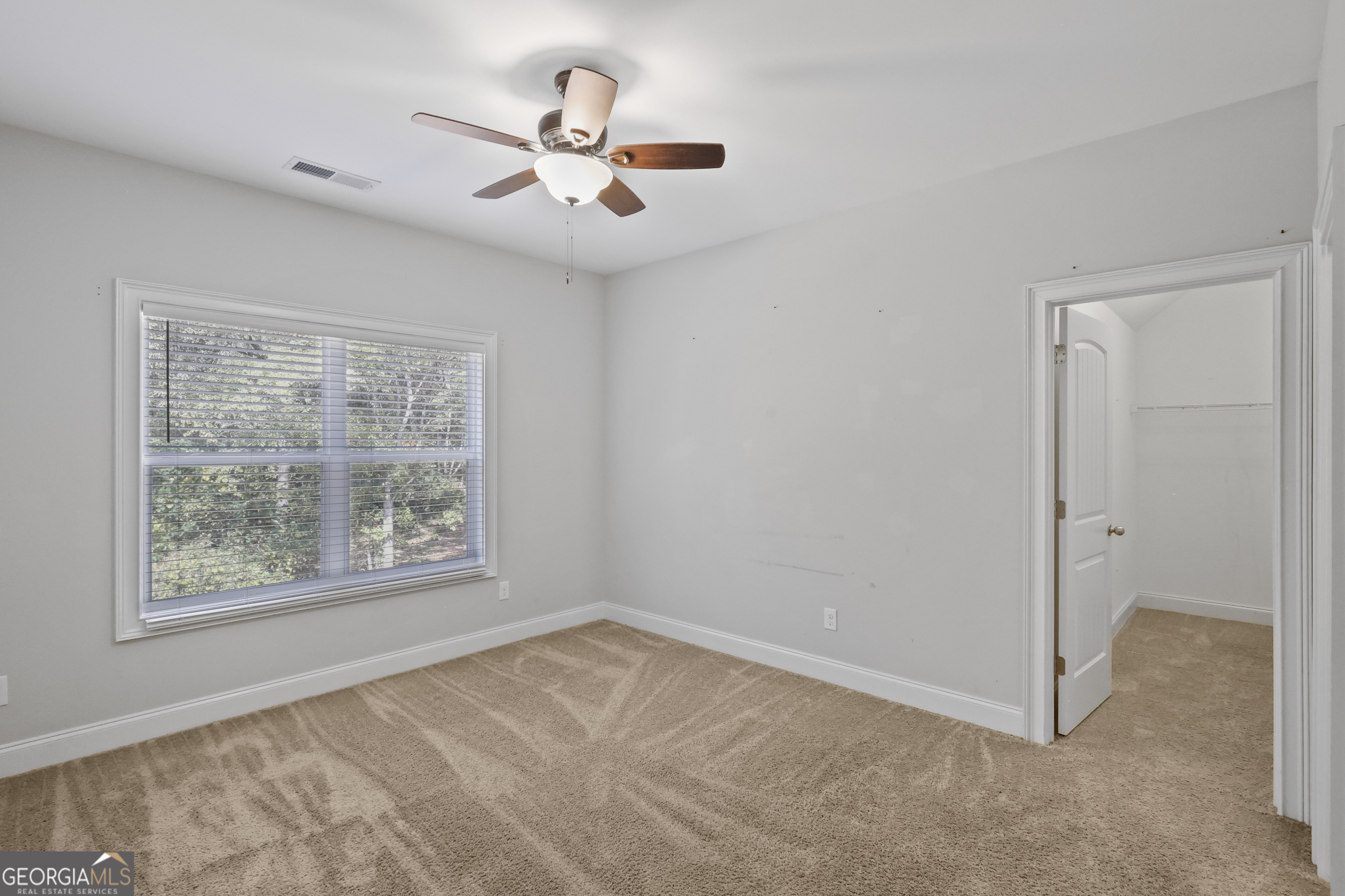 563 Wynn Road McDonough, GA 30252 - Photo 29 of 47 a view of an empty room with a window