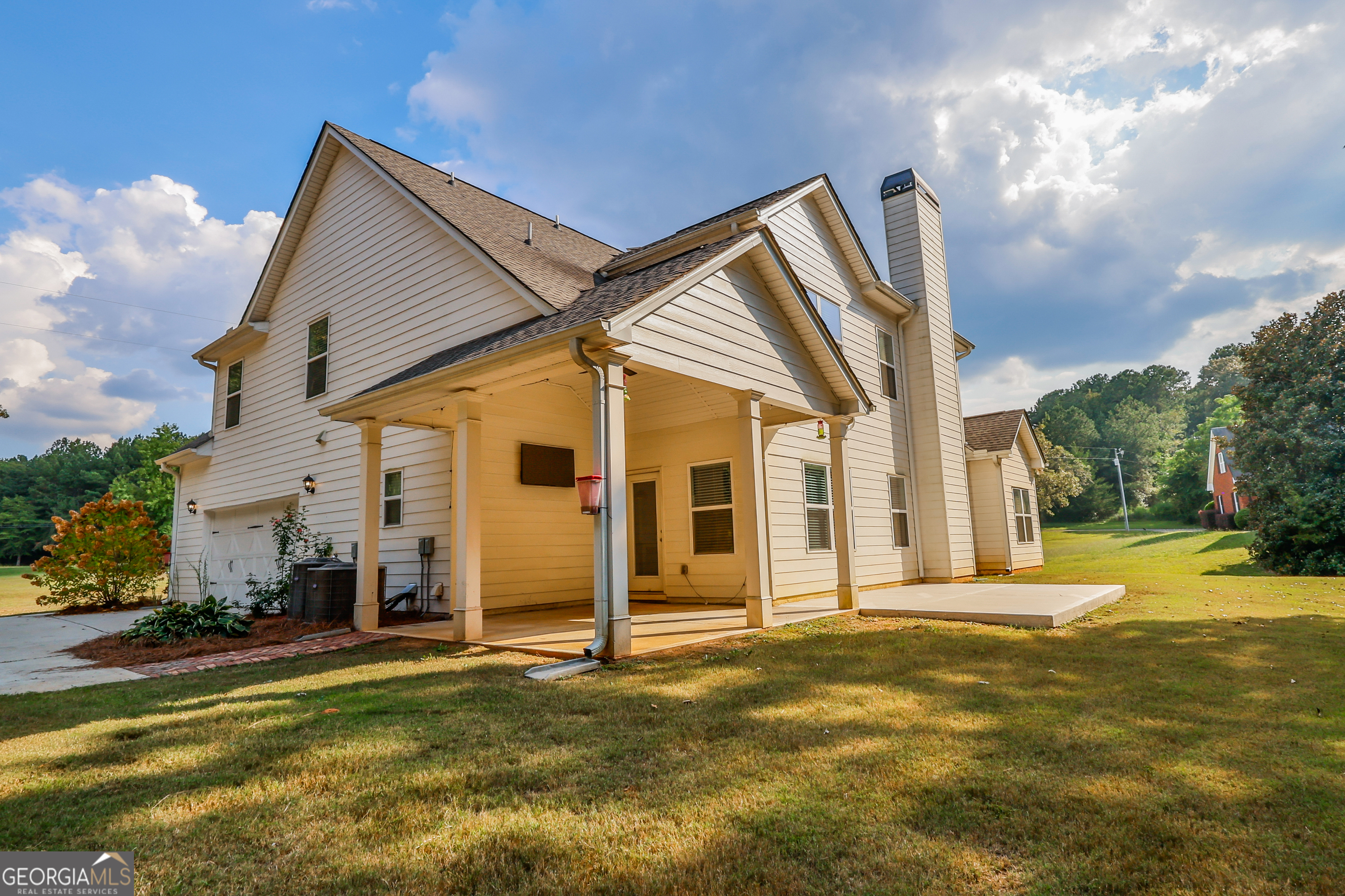 563 Wynn Road McDonough, GA 30252 - Photo 3 of 47 a view of a house with a yard and fence