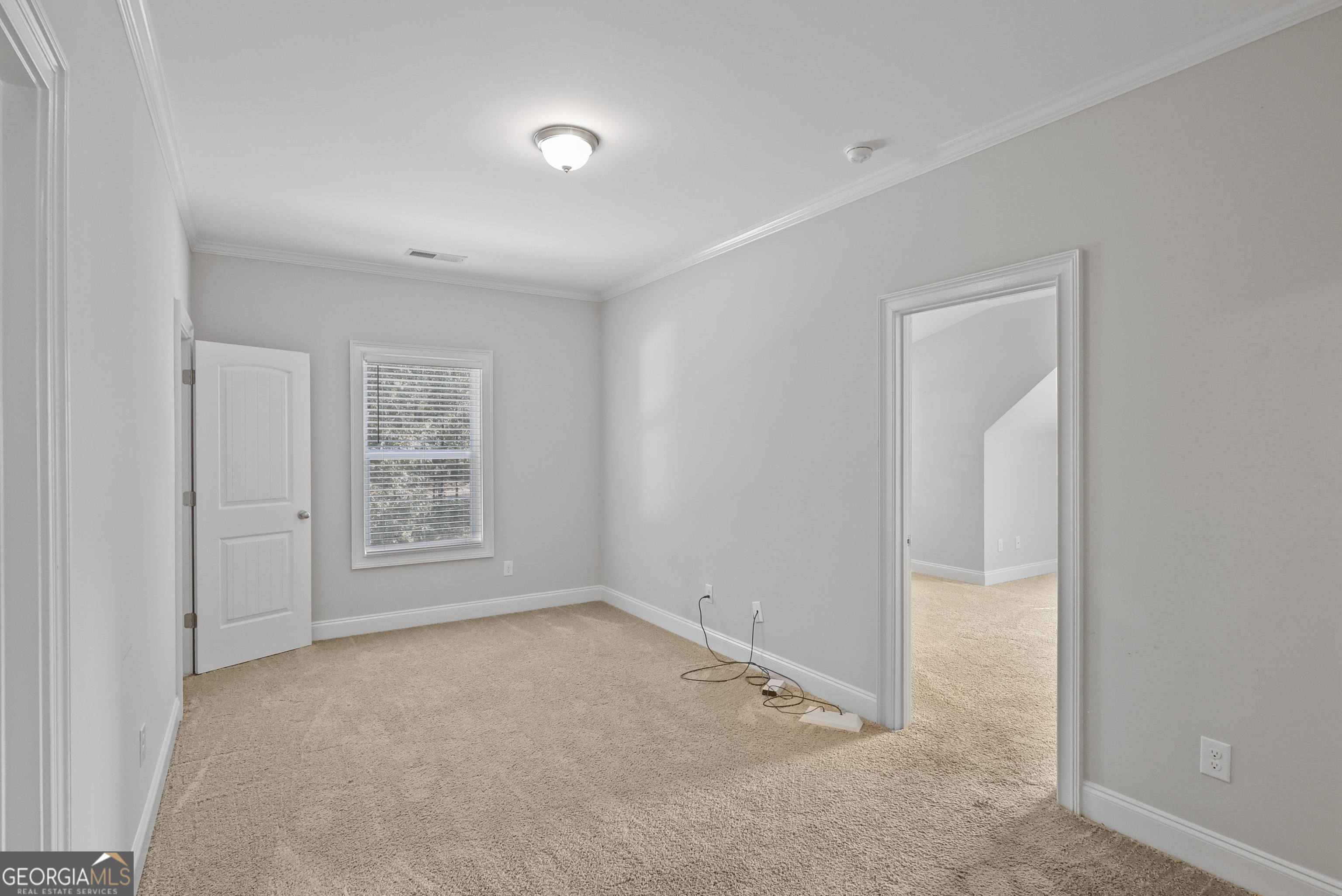 563 Wynn Road McDonough, GA 30252 - Photo 33 of 47 an empty room with windows and closet