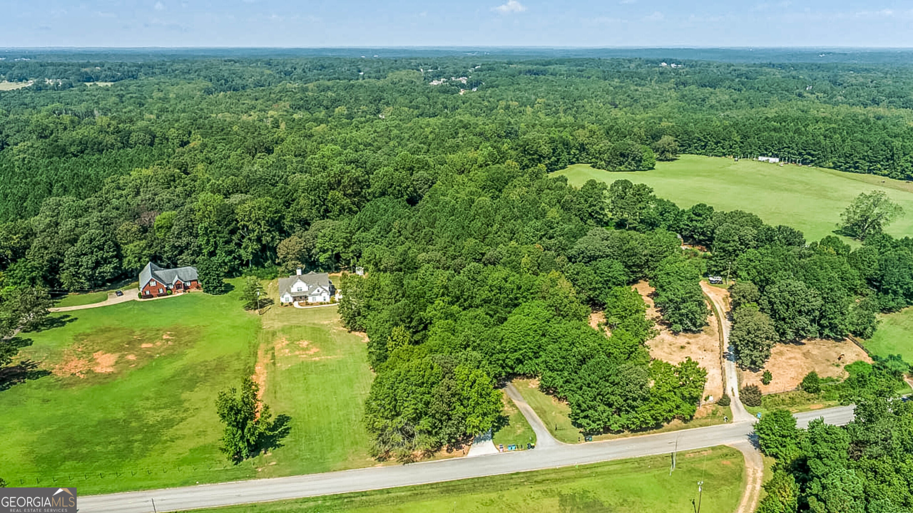 563 Wynn Road McDonough, GA 30252 - Photo 43 of 47 a view of a garden with a building