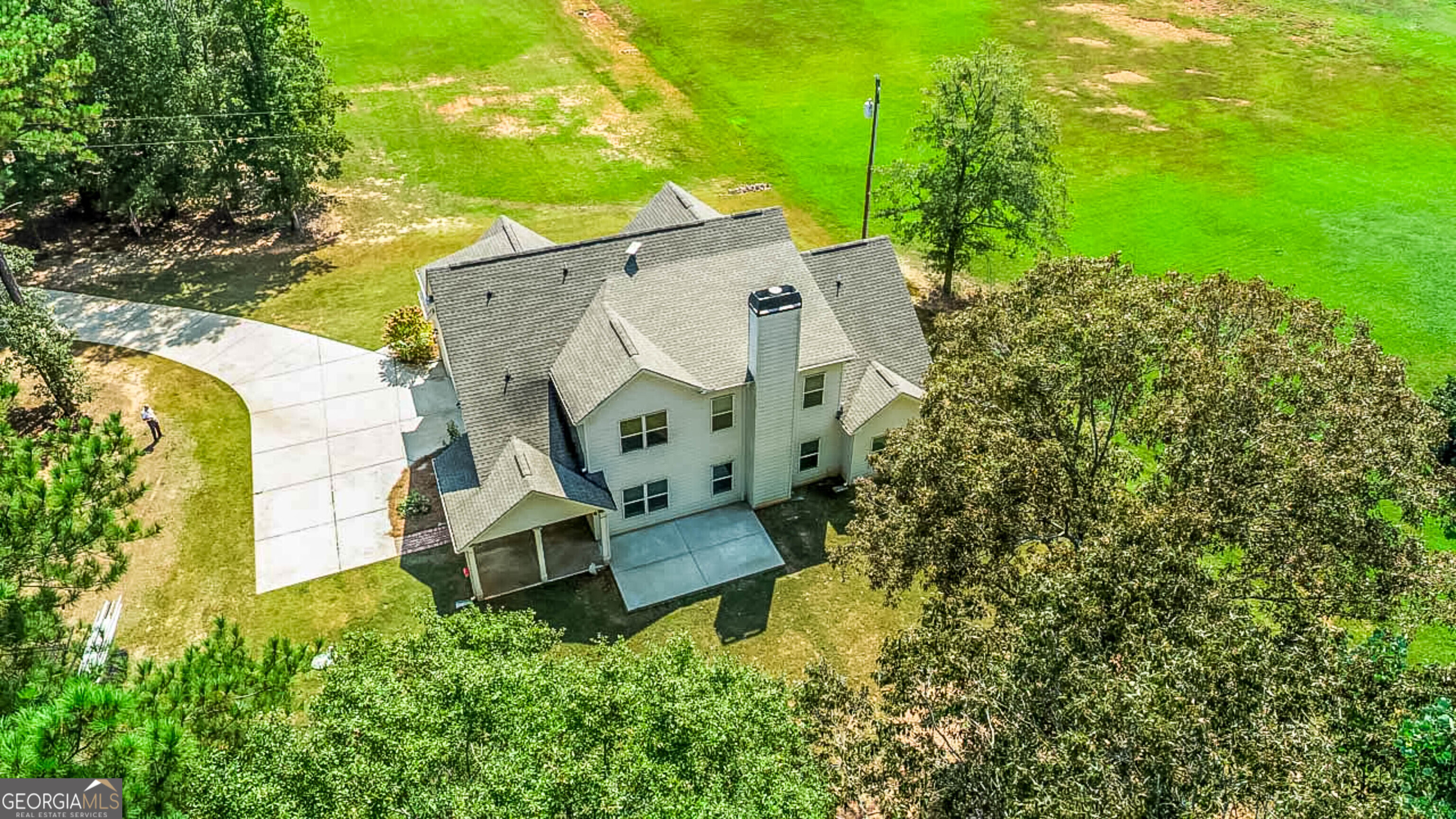 563 Wynn Road McDonough, GA 30252 - Photo 47 of 47 an aerial view of a house with swimming pool and wooden fence